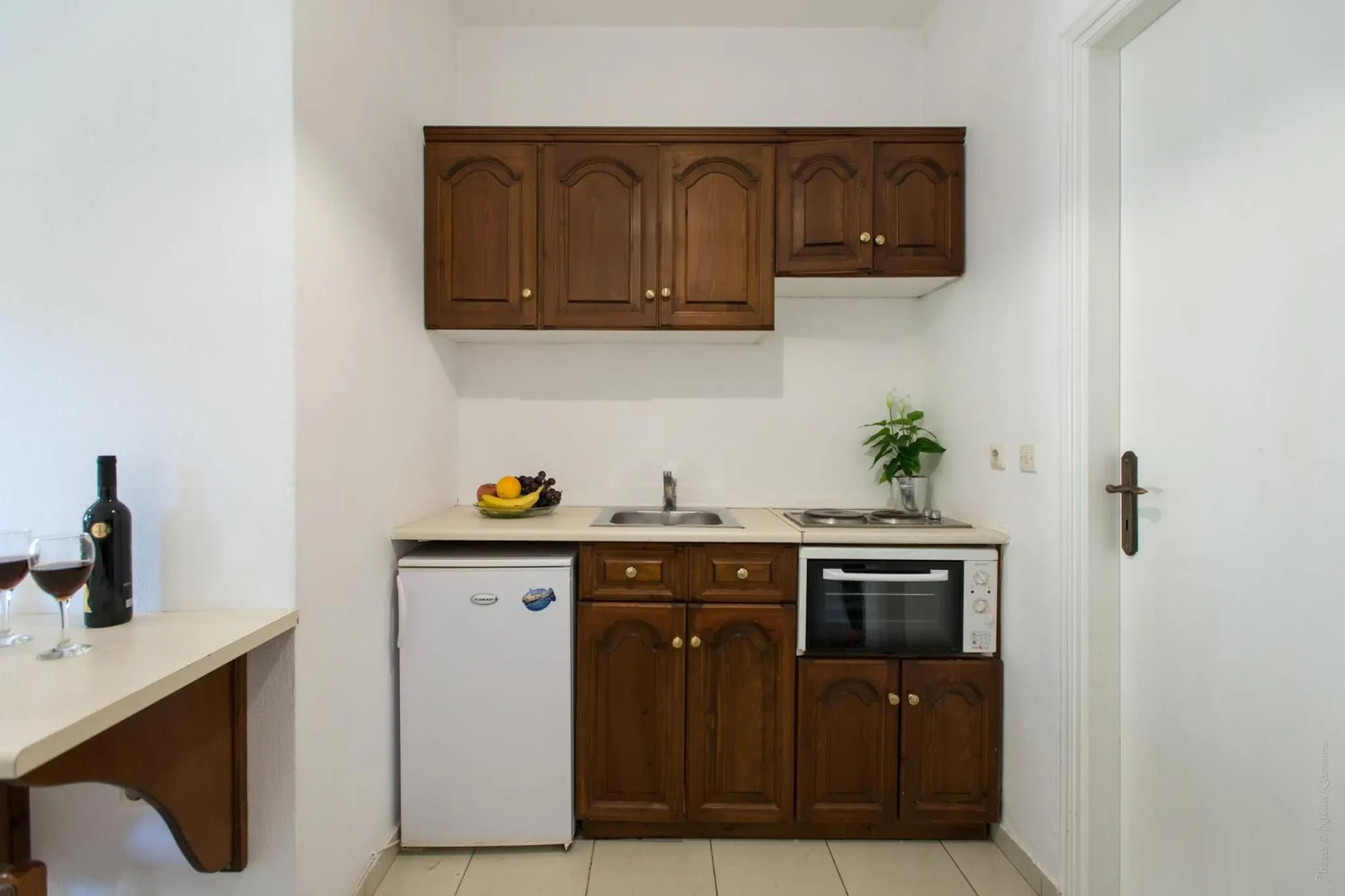 Kitchen or kitchenette in Philippos Hotel