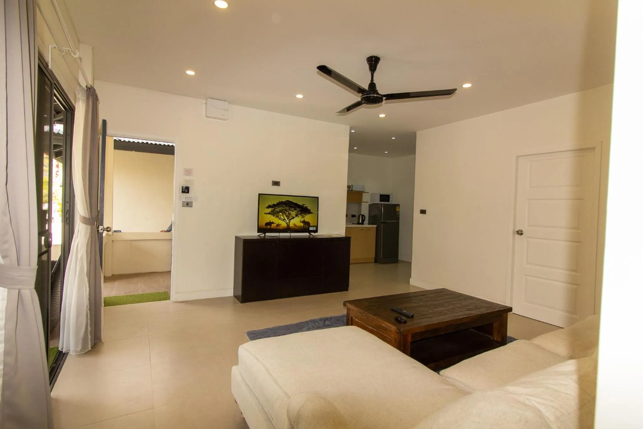 Communal lounge/ TV room, Bed in Aussieland Bungalows
