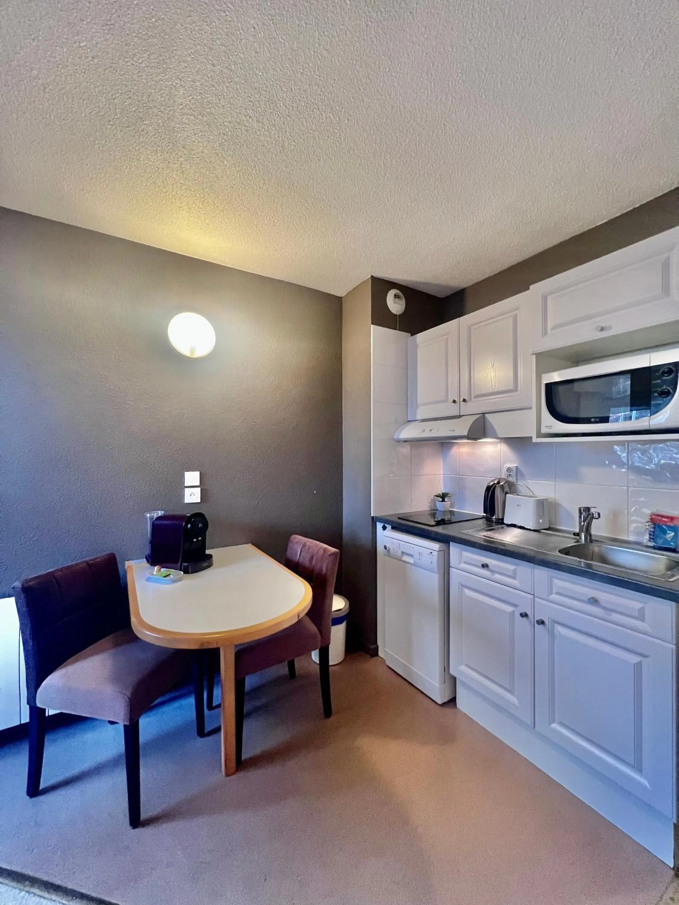 Kitchen or kitchenette in Résidence Côté Chalet