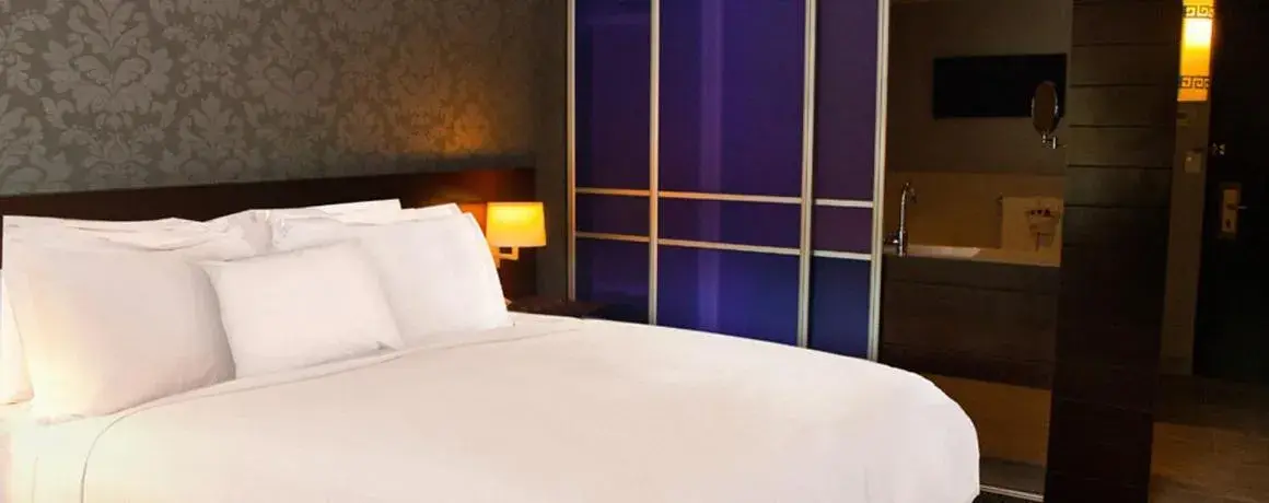 Photo of the whole room, Bed in The Royal Regency Hotel Photo of the whole room, Bed in The Royal Regency Hotel