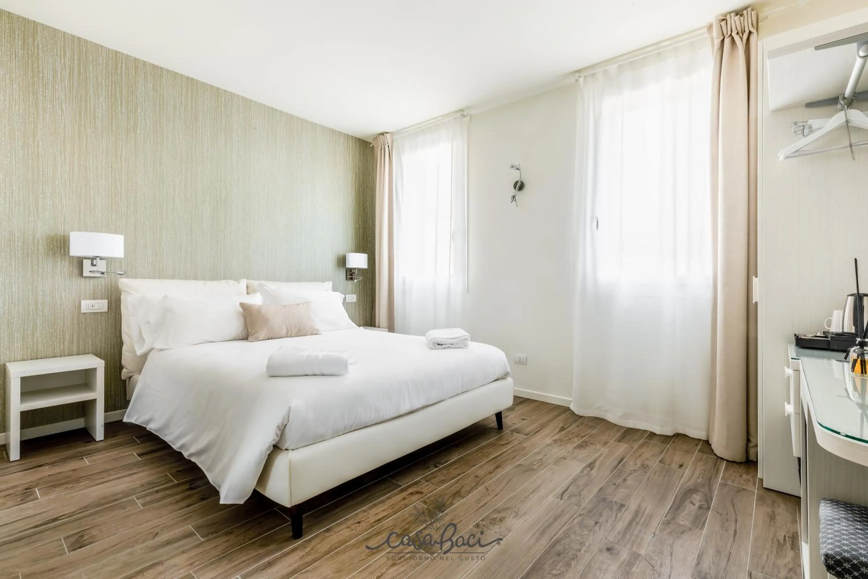 Photo of the whole room, Bed in CASA BACI - Soggiorno nel Gusto