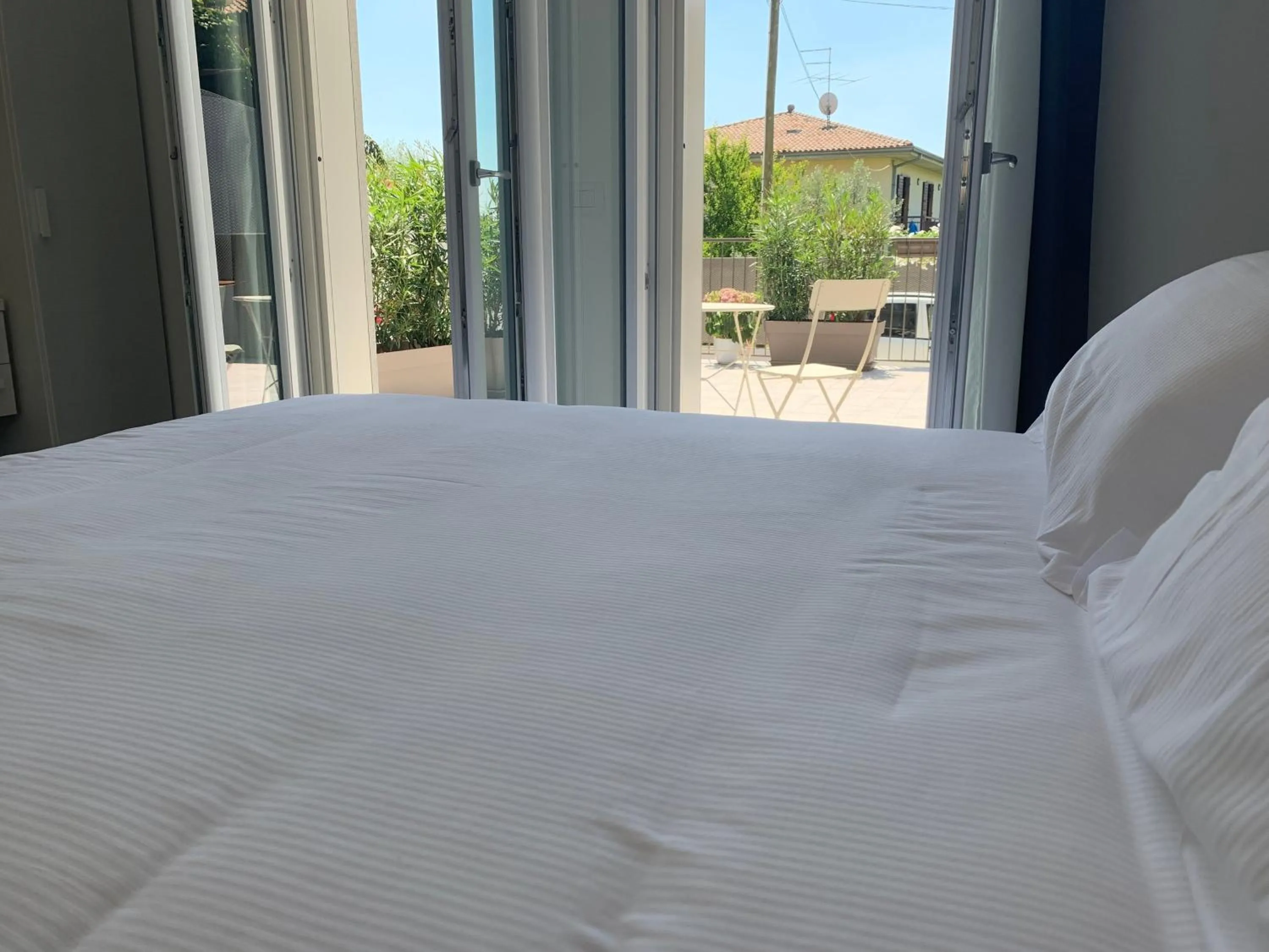 View (from property/room), Bed in CASA BACI - Soggiorno nel Gusto