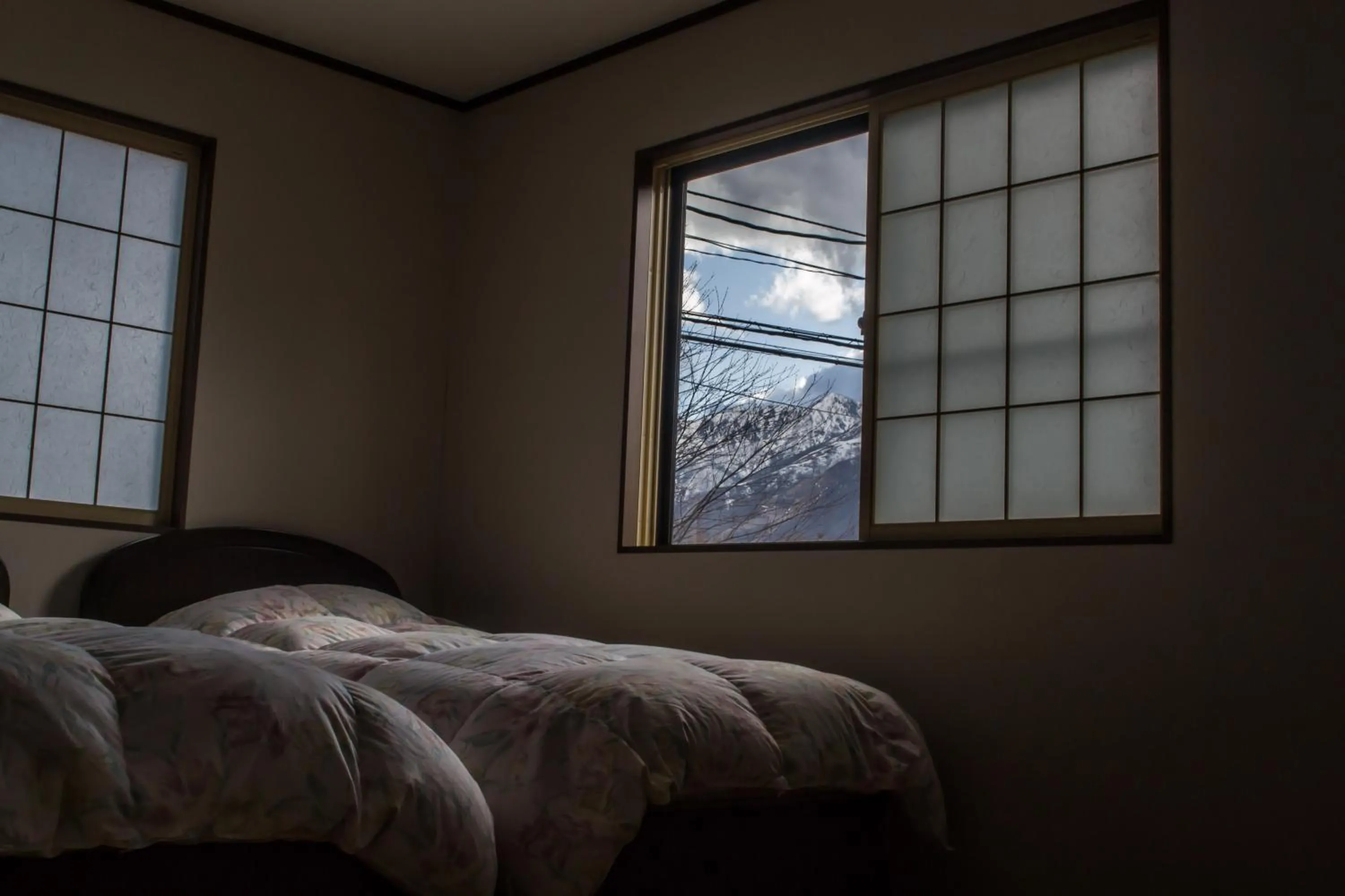 Bed in Hakuba Powder Lodge Taketombo