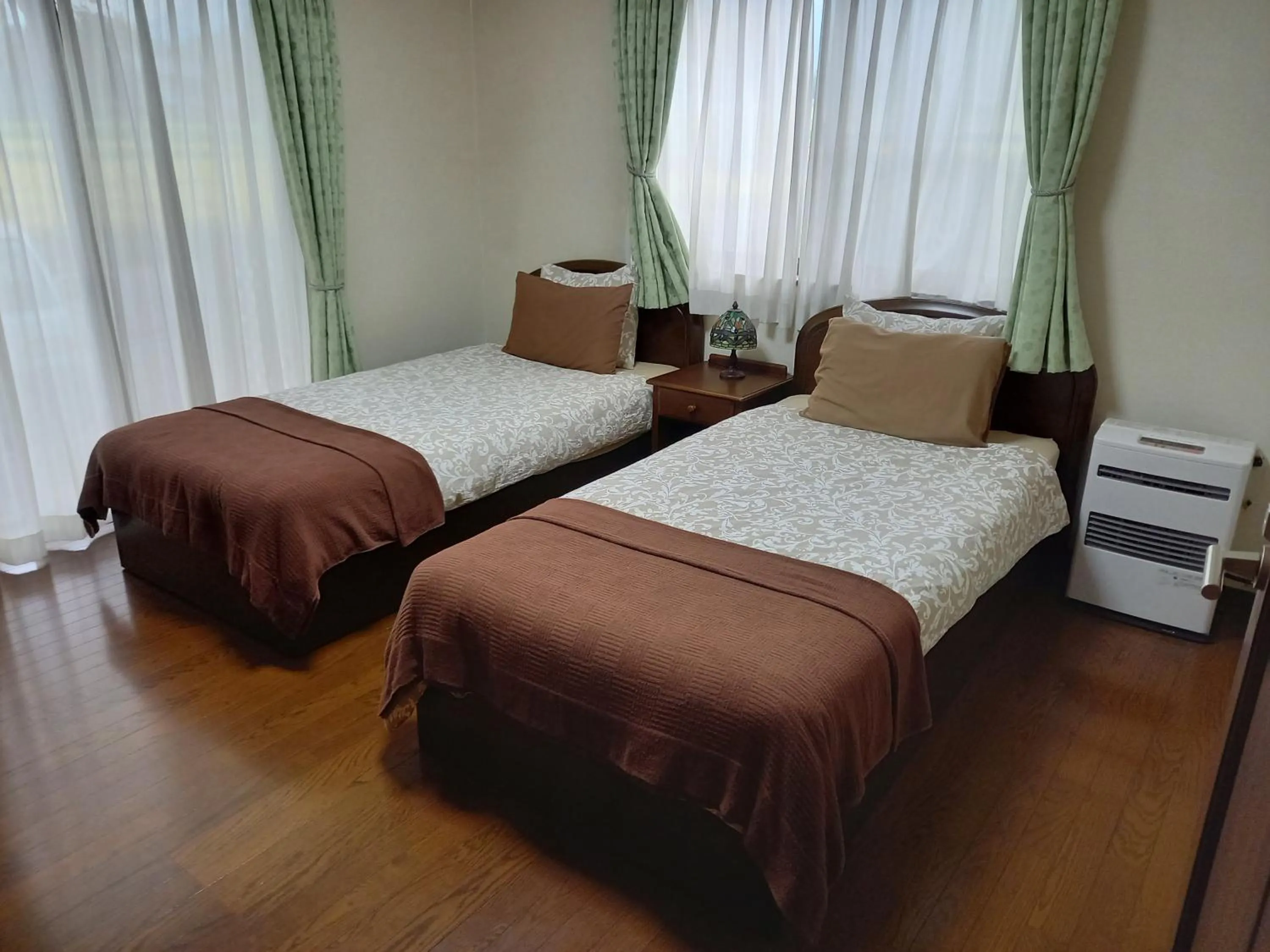 Photo of the whole room, Bed in Hakuba Powder Lodge Taketombo