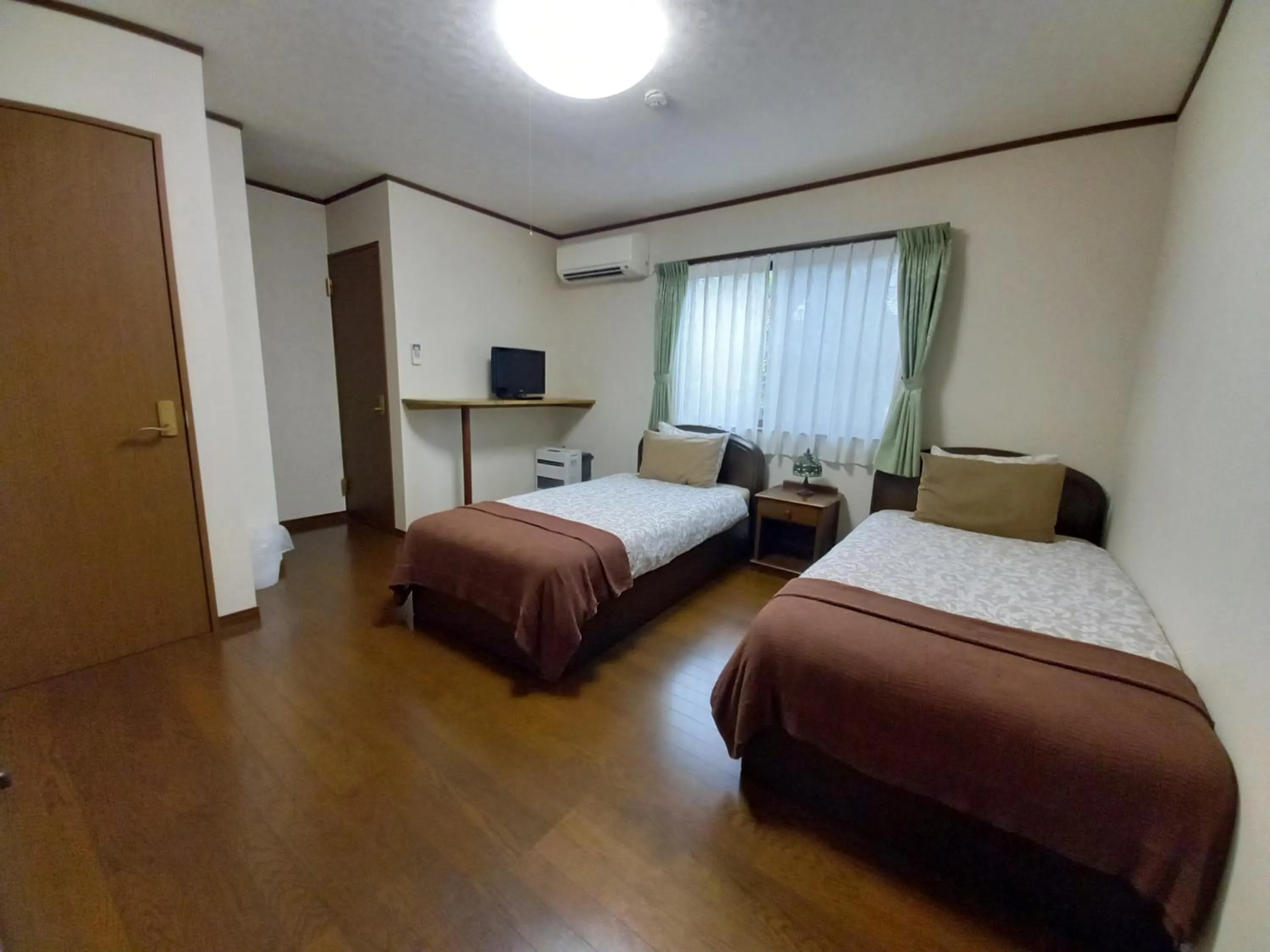 Photo of the whole room, Bed in Hakuba Powder Lodge Taketombo