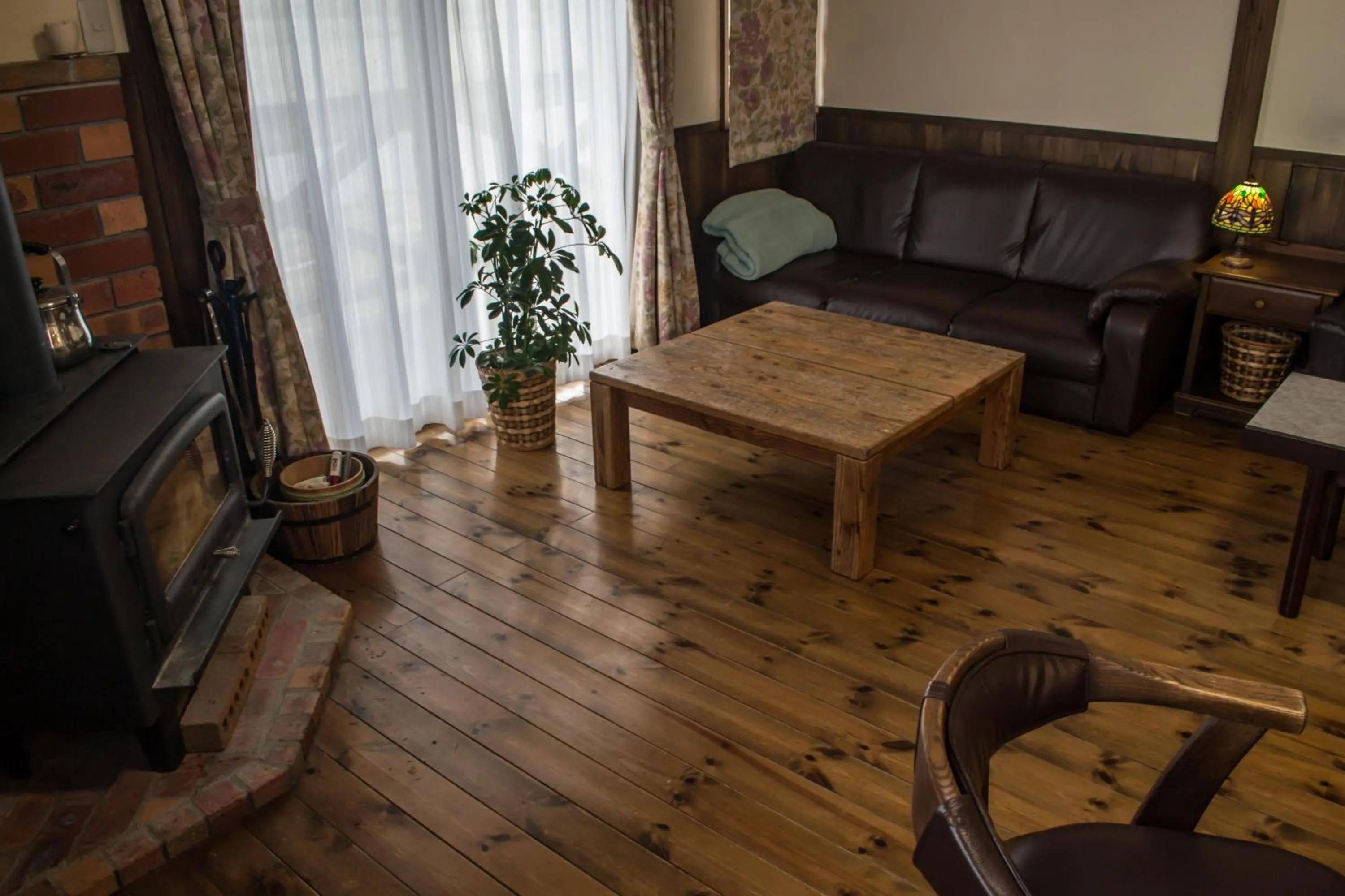 Living room in Hakuba Powder Lodge Taketombo