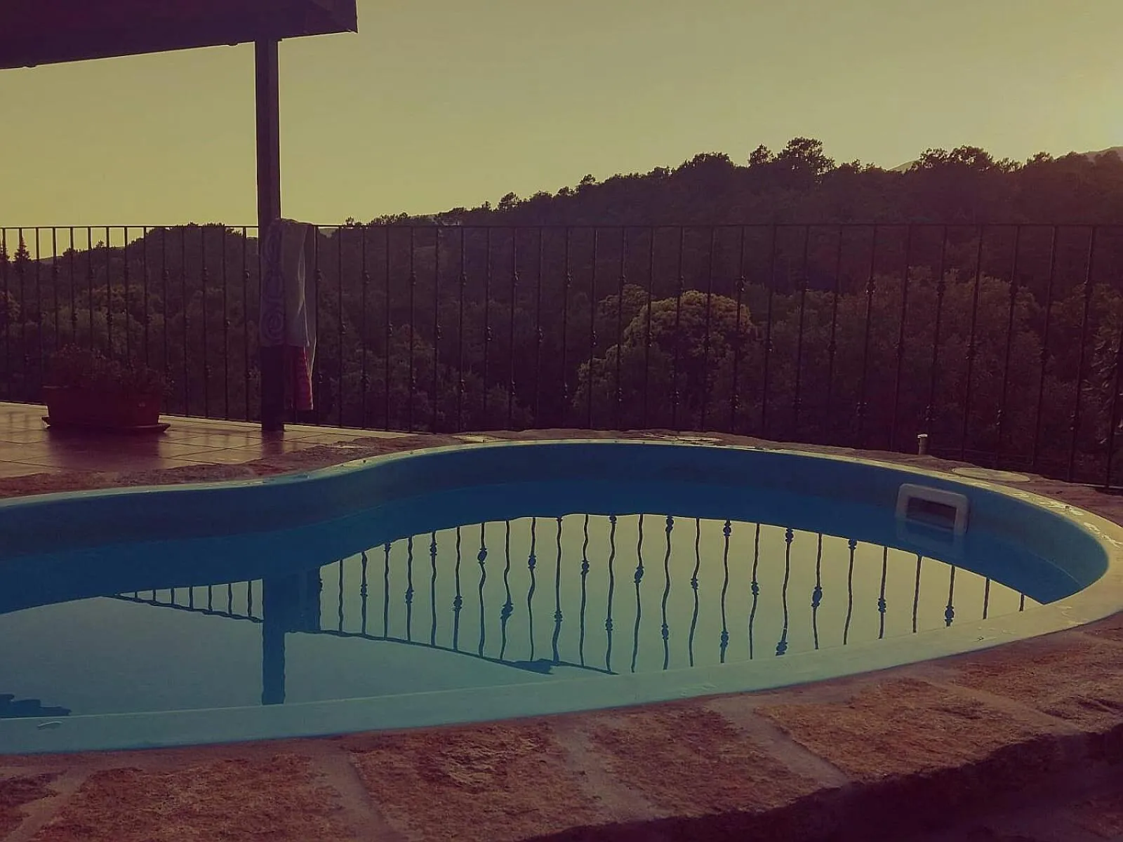 Swimming pool in El Retiro de Ceubia by RetiroRural