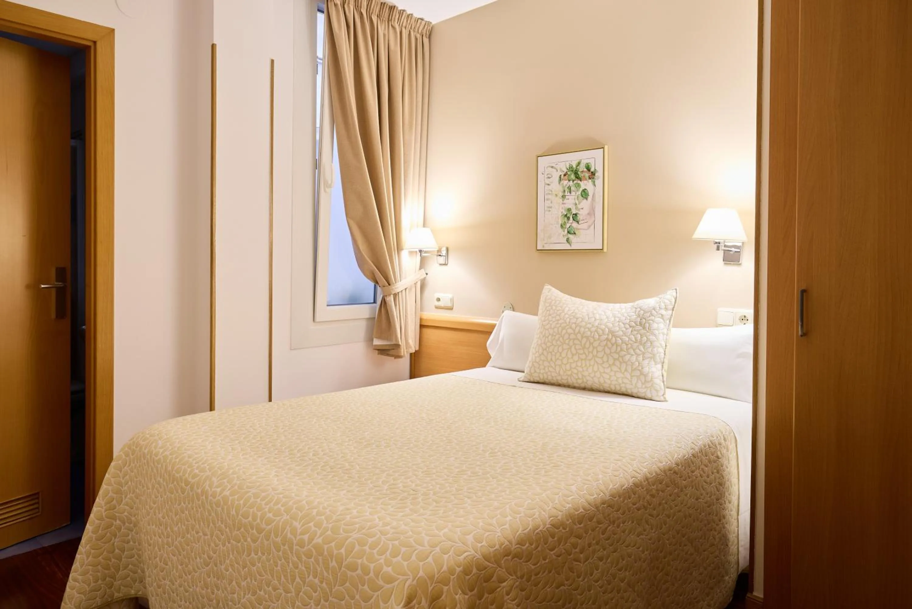 Bed in Pensión Nuevas Artes
