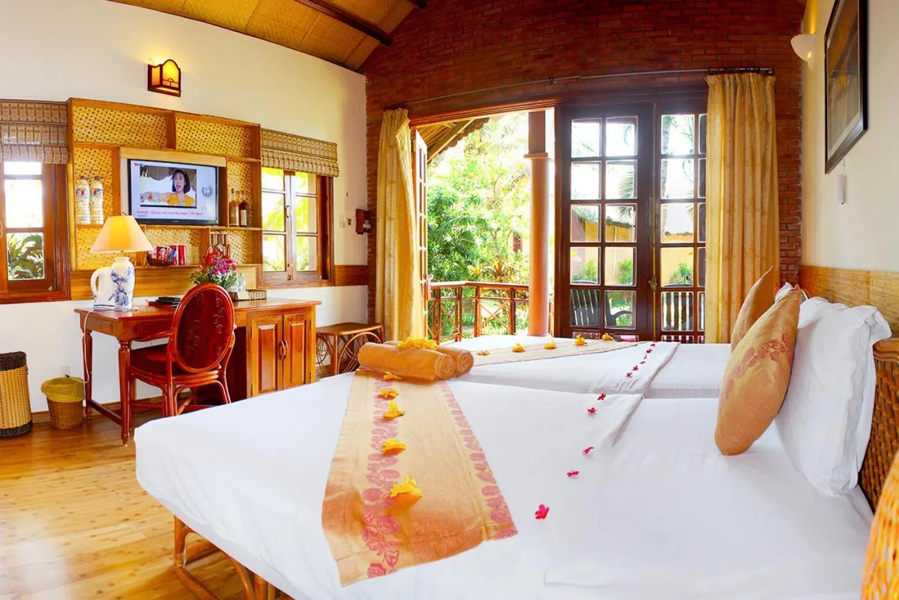 Bed in Little Muine Cottages Resort