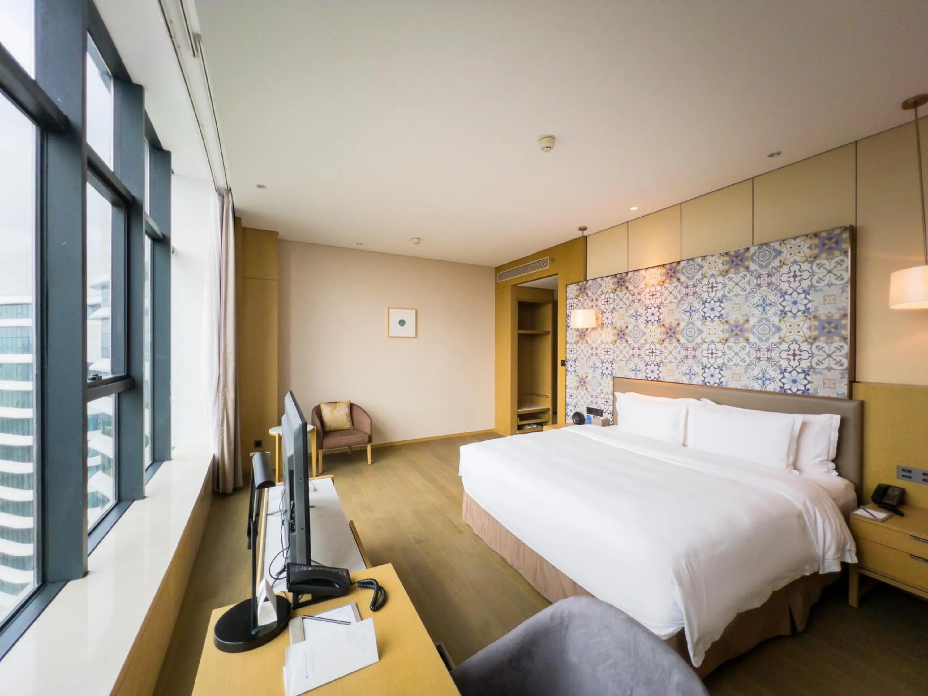 Decorative detail, Bed in Wyndham Grand Plaza Royale Yuzhou Xiamen Wuyuan Bay