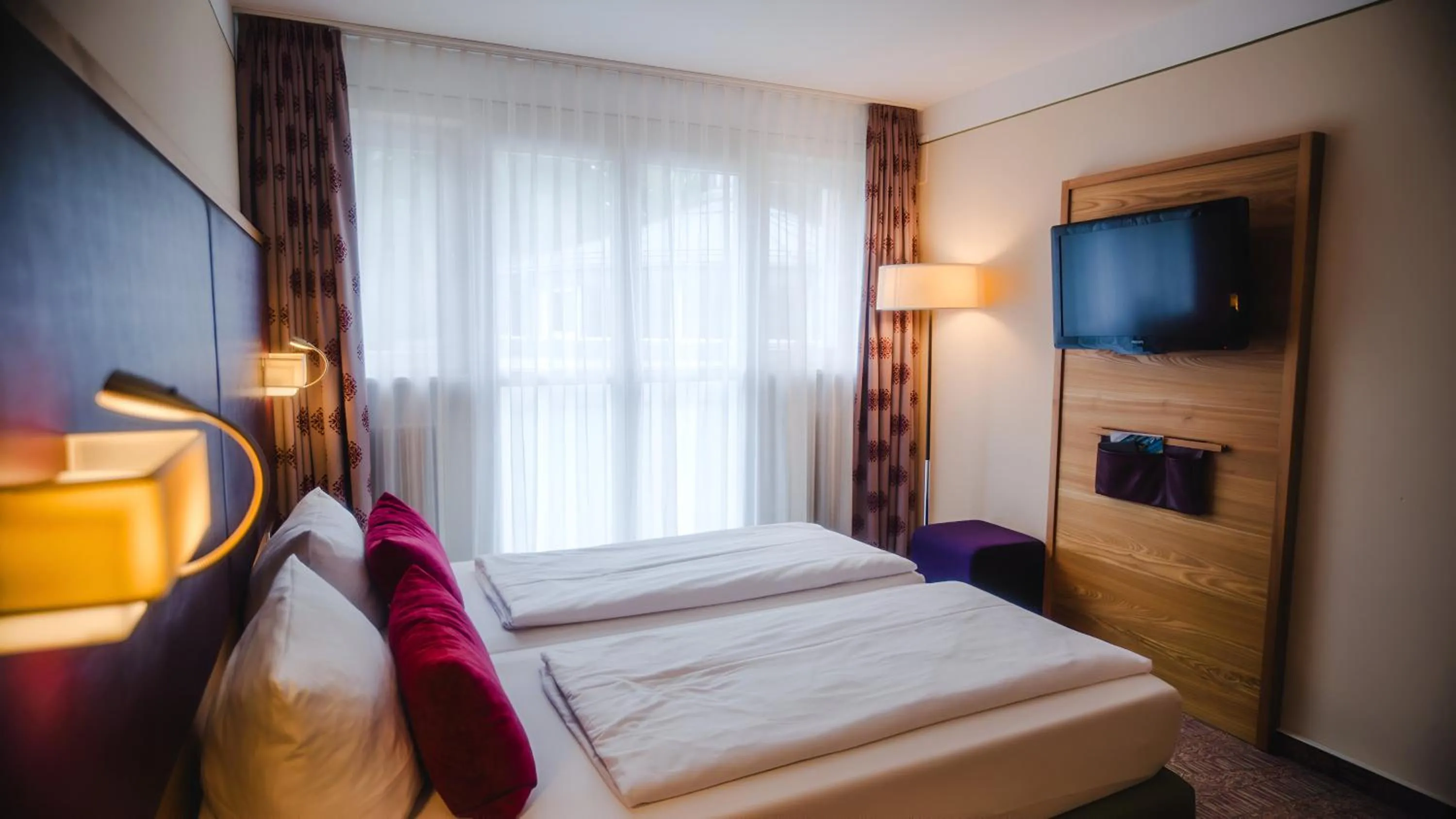 Photo of the whole room, Bed in Hotel Raphael im Allgäu