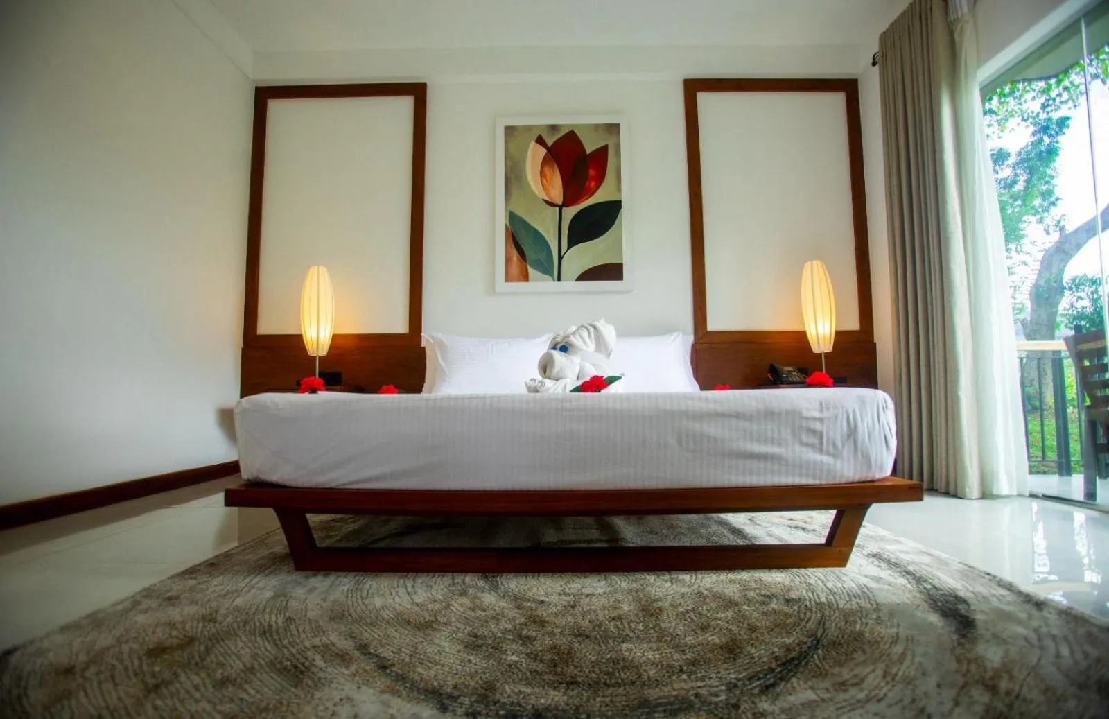 Bed in Tropical Life Resort and Spa