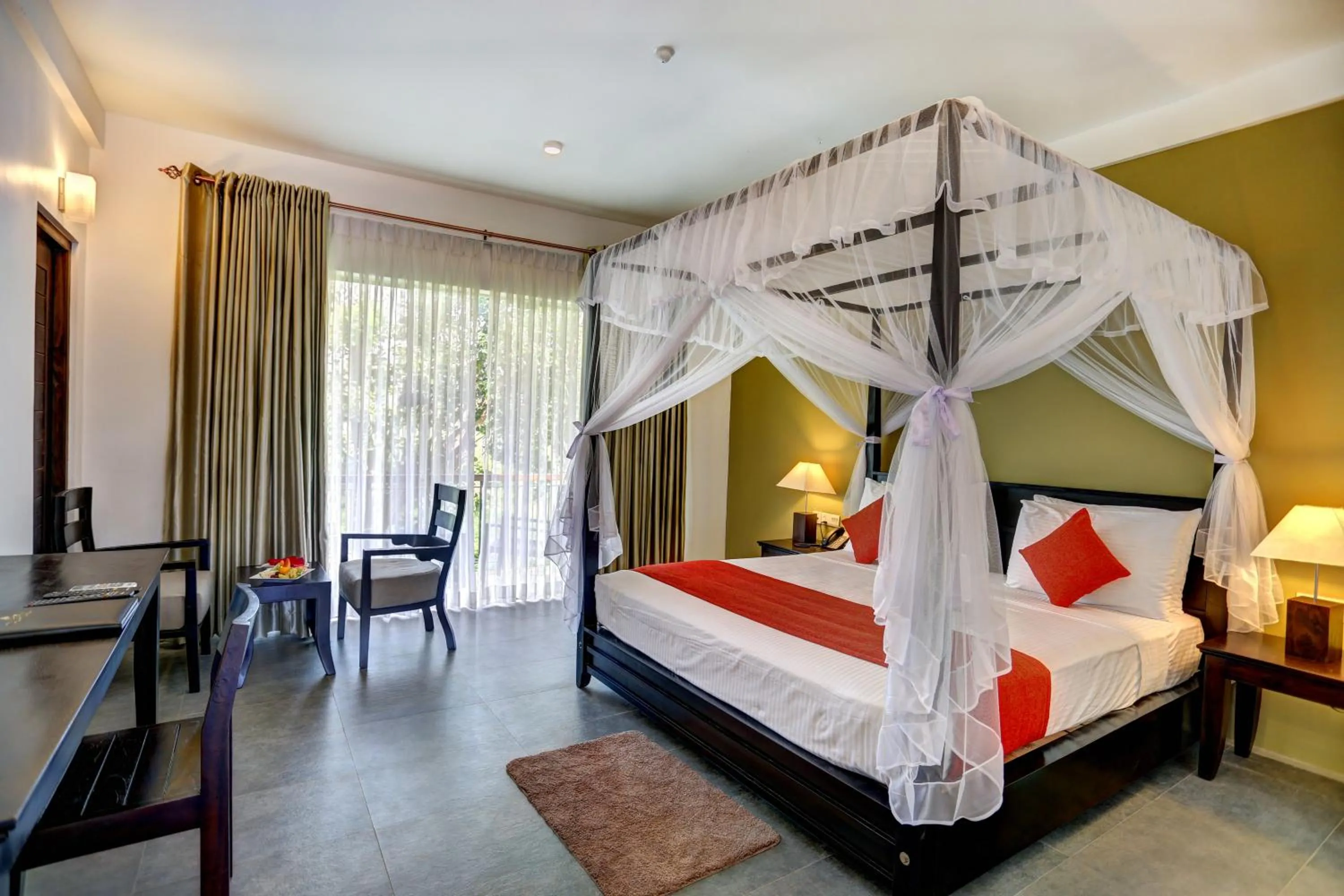 Bed in Tropical Life Resort and Spa
