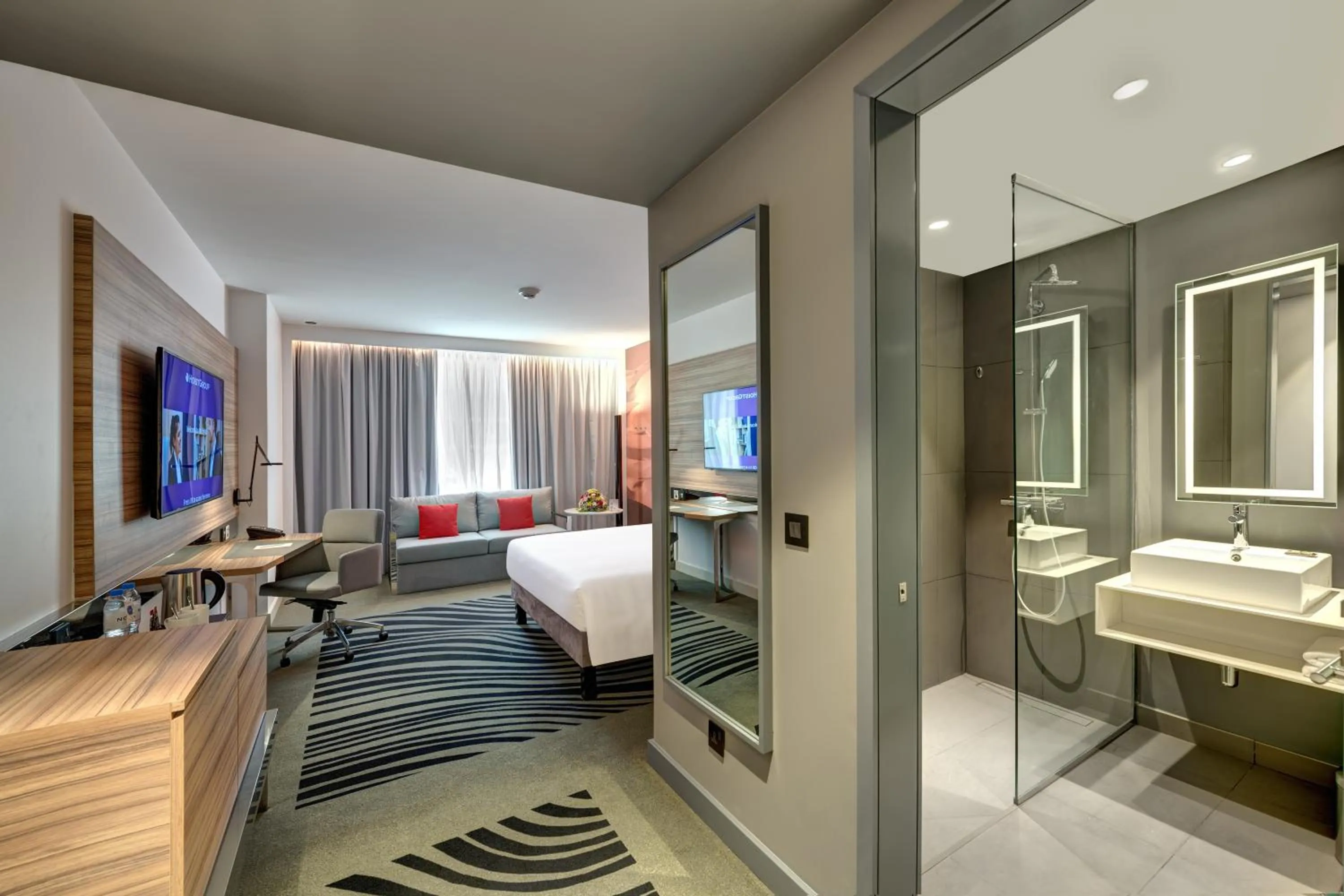 Photo of the whole room, Bed in Novotel Sharjah Expo Centre