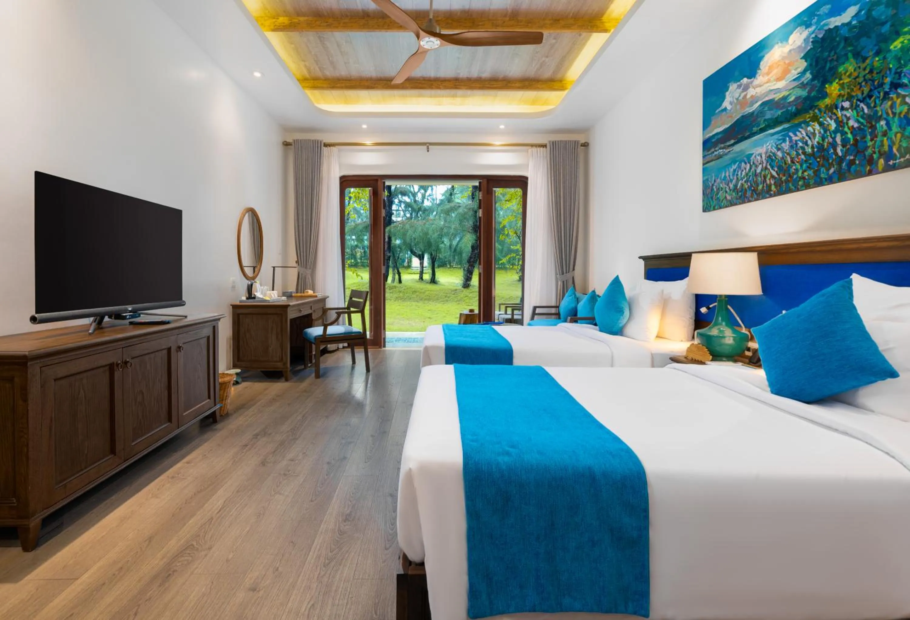 Communal lounge/ TV room, Bed in Stelia Beach Resort