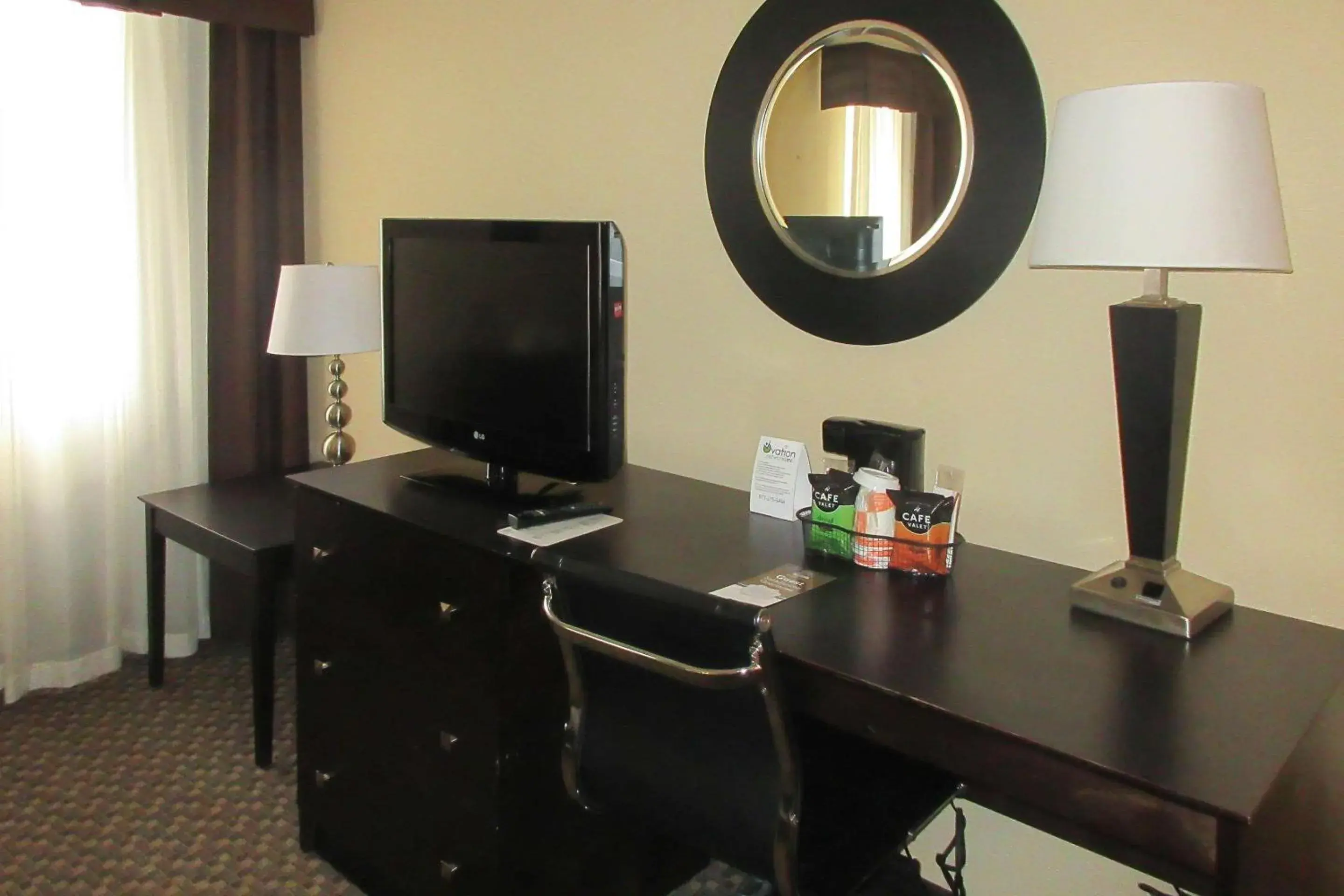 Photo of the whole room, TV/Entertainment Center in MainStay Suites