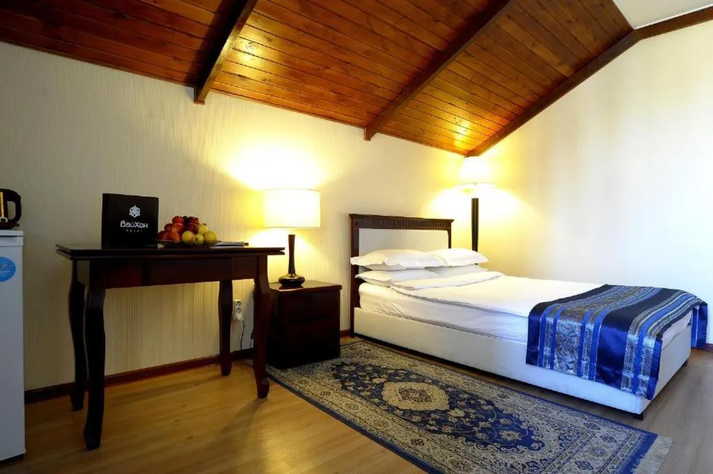 Bed in Tian-Shan Hotel