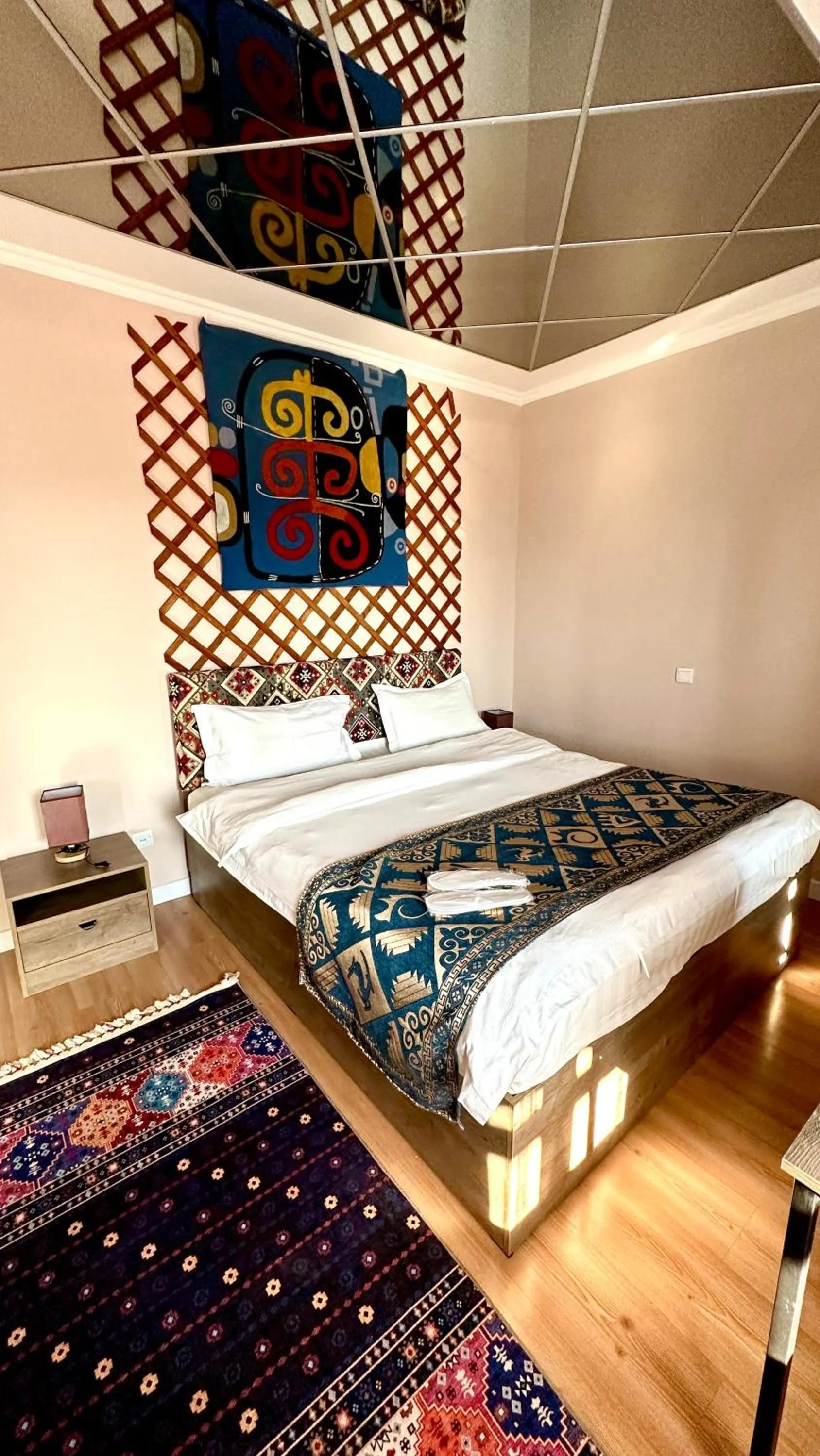 Bed in Tian-Shan Hotel