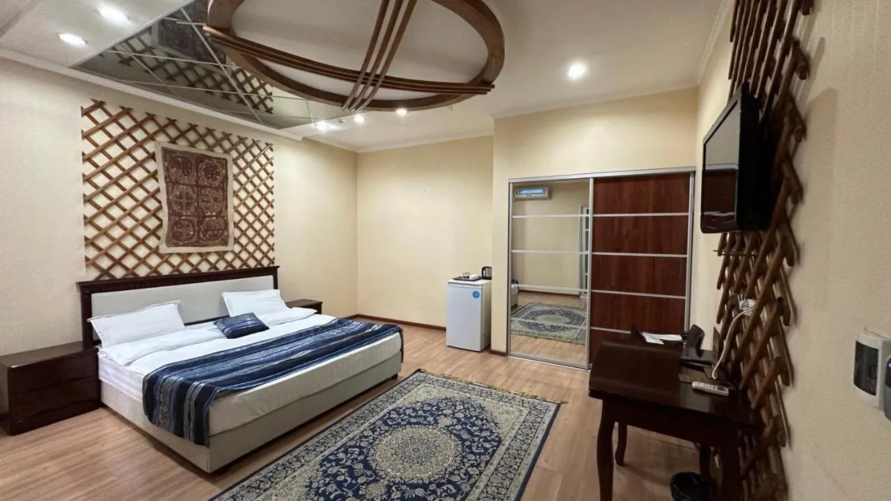 Bed in Tian-Shan Hotel