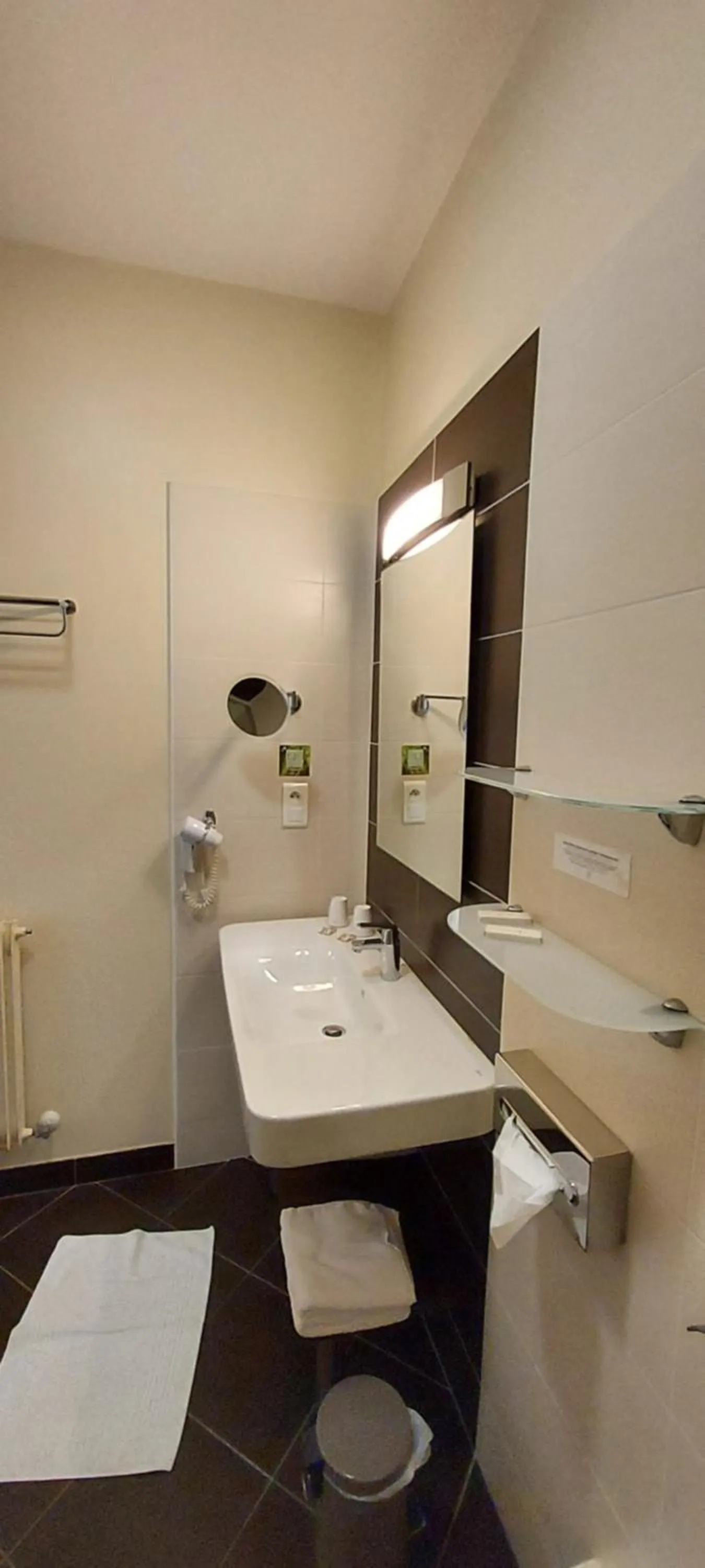 Bathroom in Logis Hotel Belle-Vue