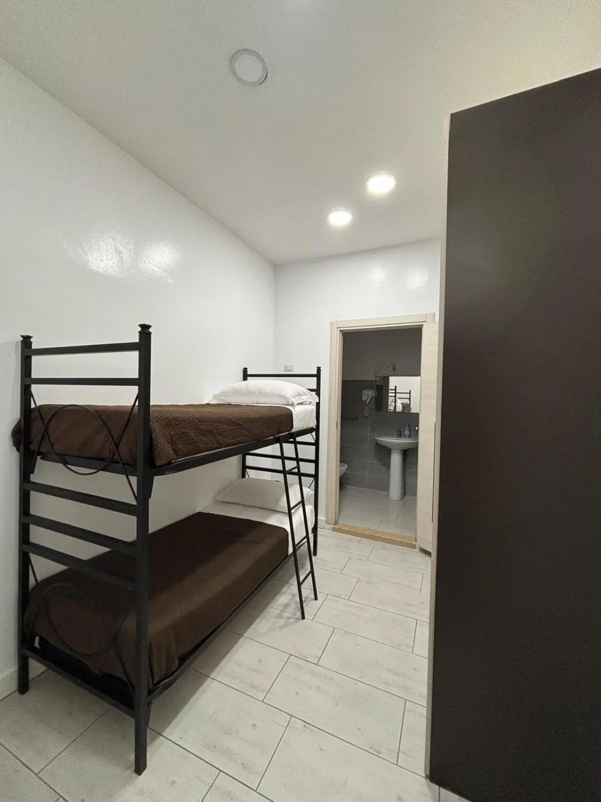 Bed in Primo Hotel