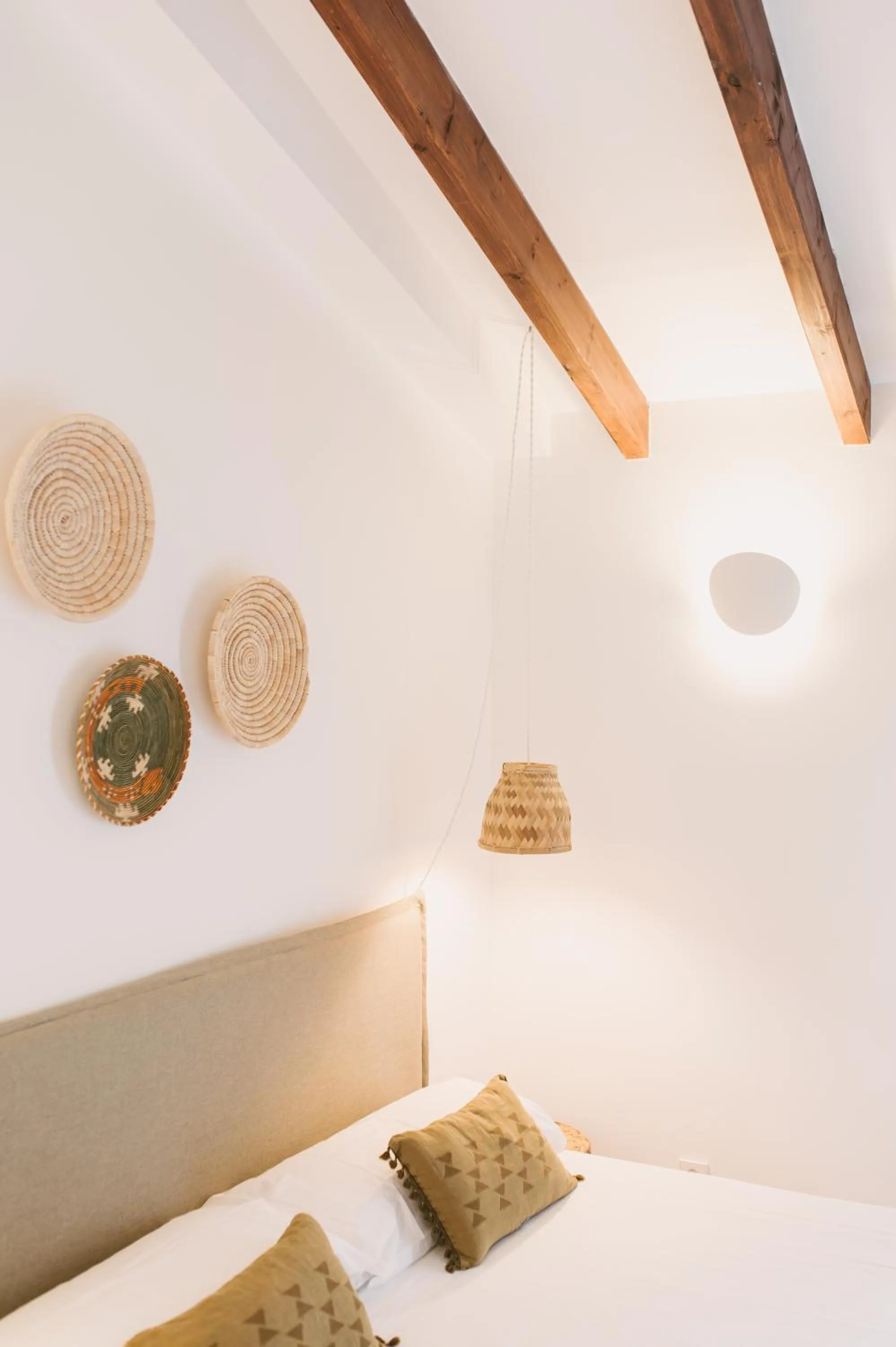 Bed in Curolla Petit Hotel