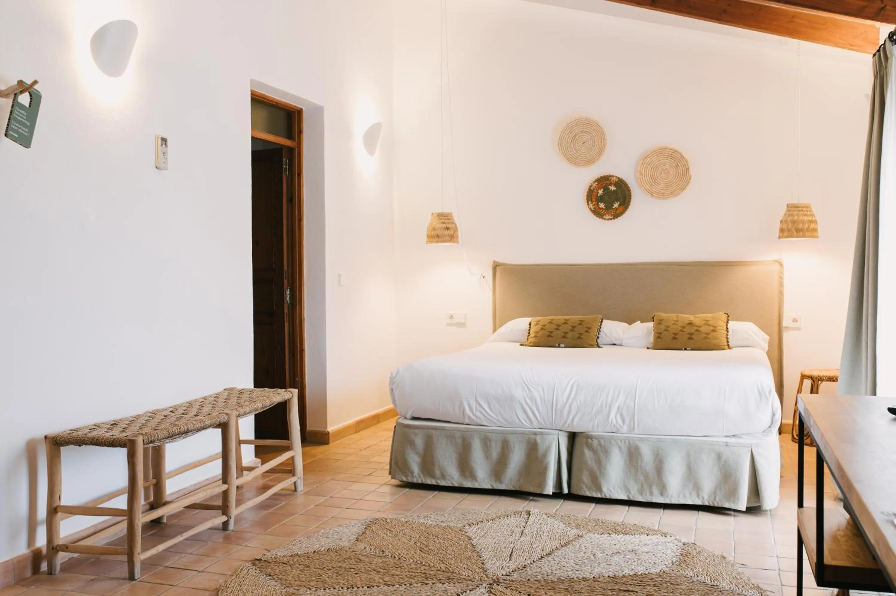 Bed in Curolla Petit Hotel