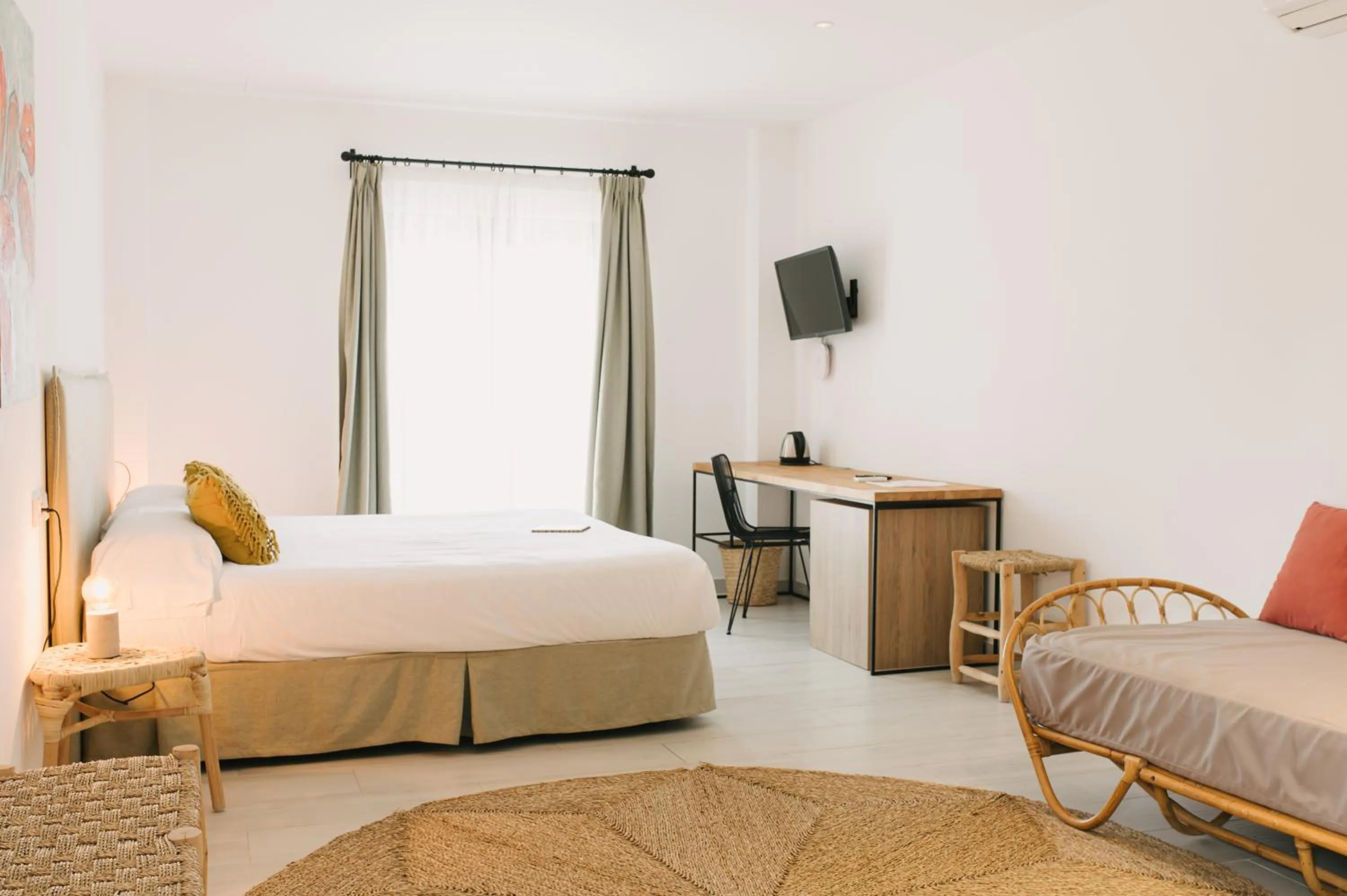 Bed in Curolla Petit Hotel