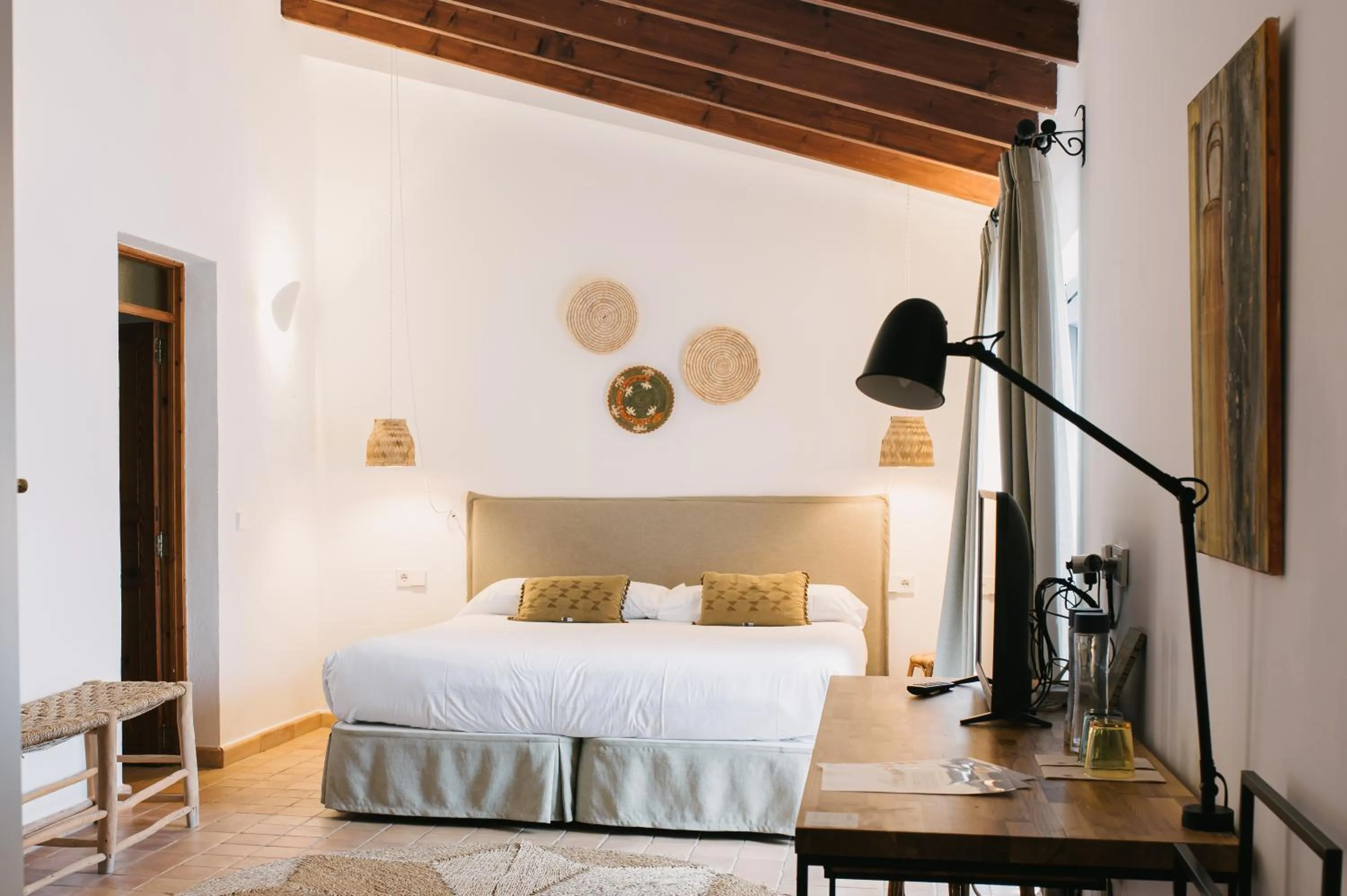 Bed in Curolla Petit Hotel