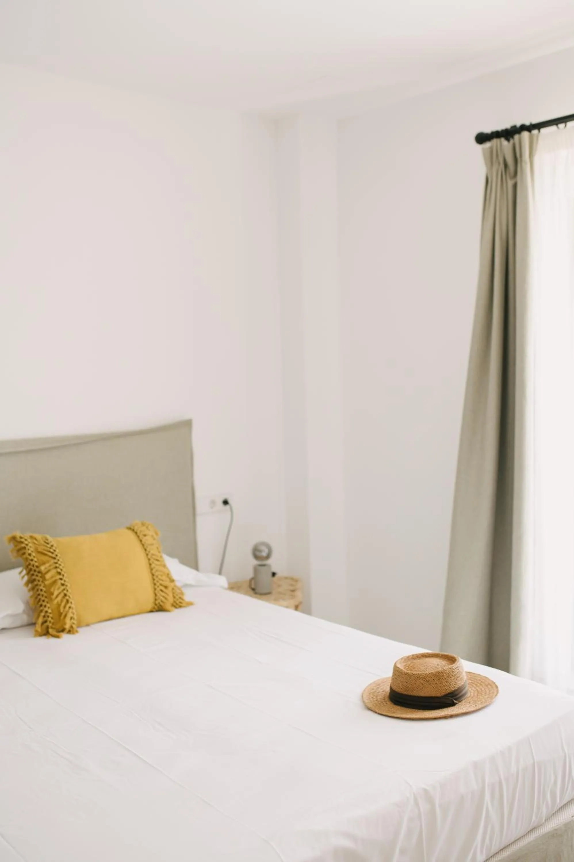 Bed in Curolla Petit Hotel