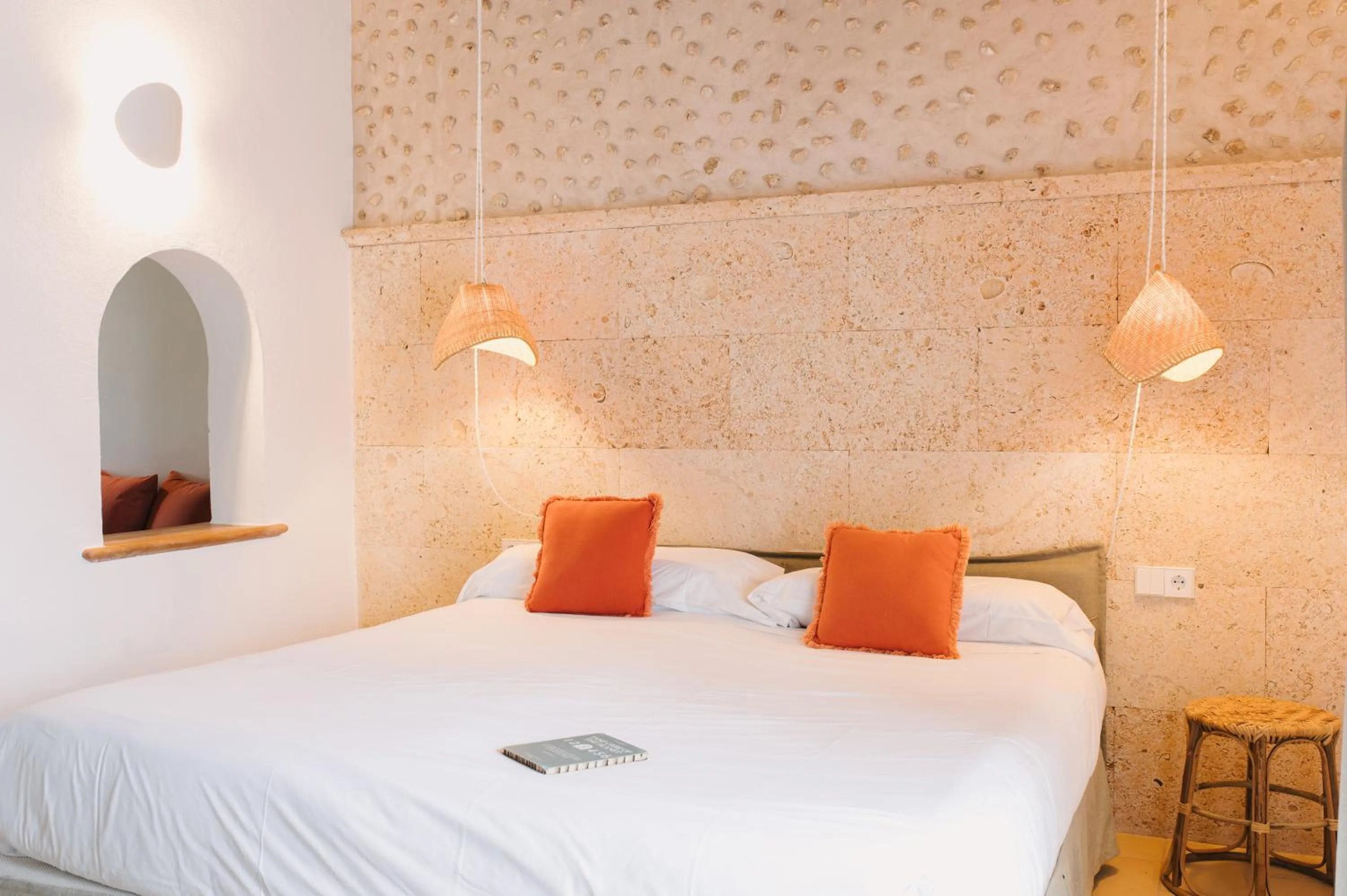 Bed in Curolla Petit Hotel