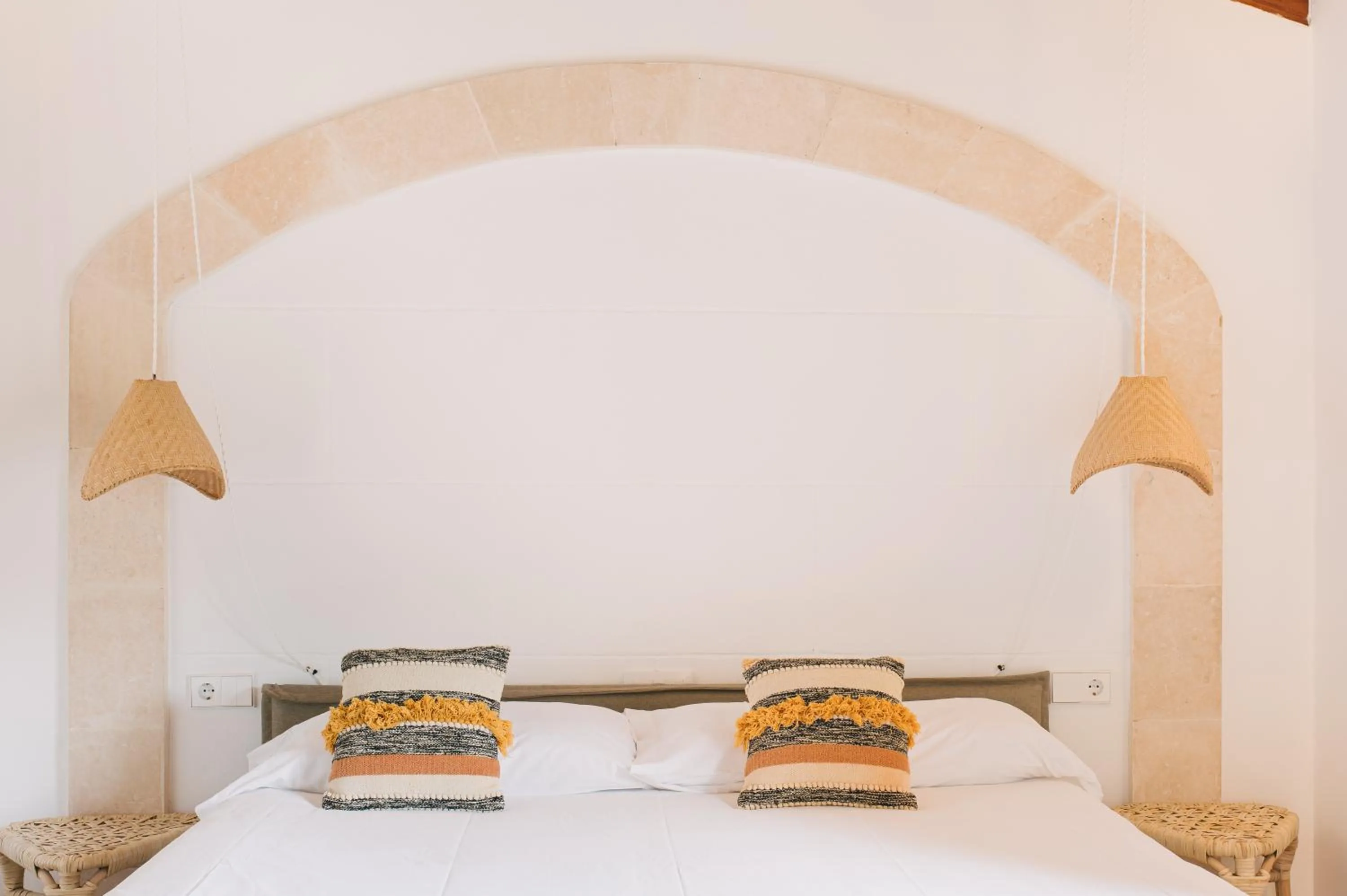 Bed in Curolla Petit Hotel