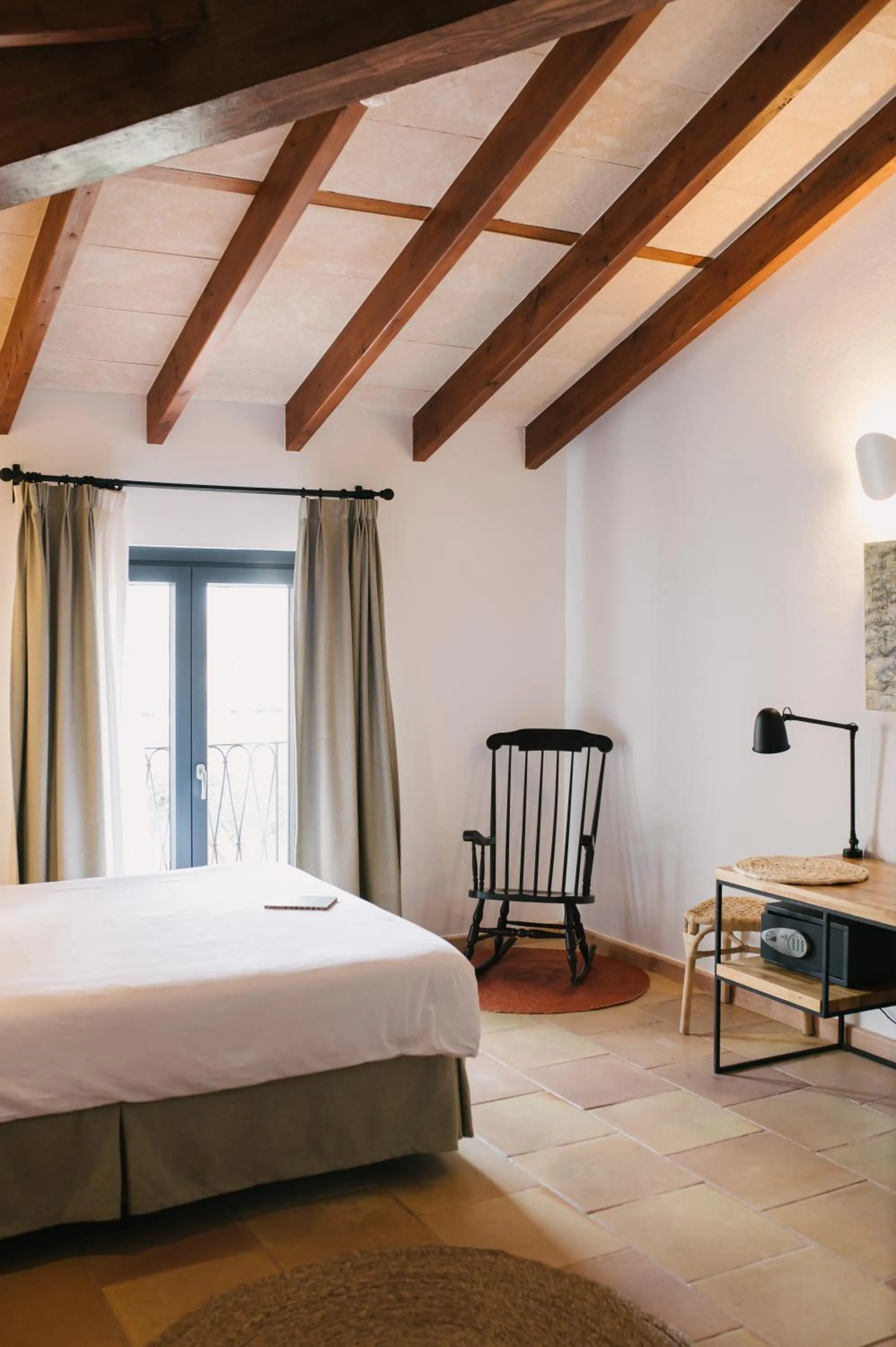 Bed in Curolla Petit Hotel