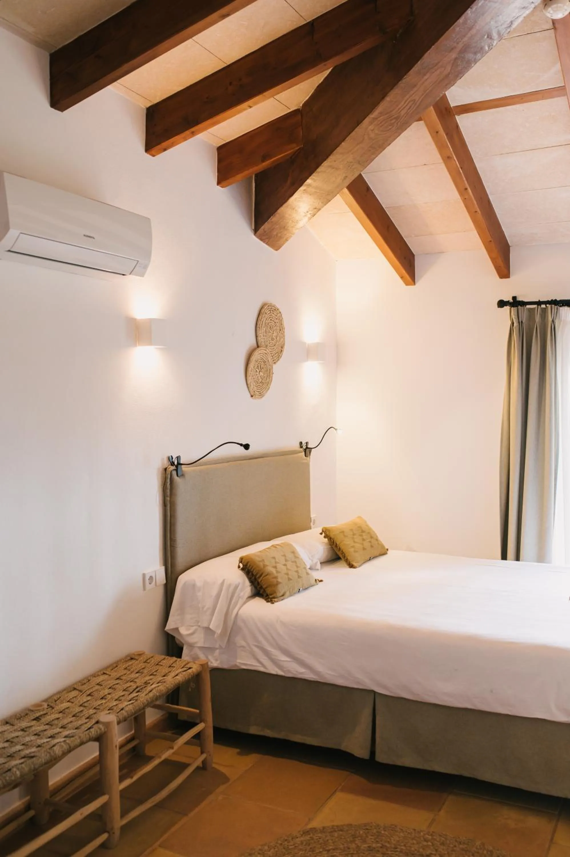 Bed in Curolla Petit Hotel