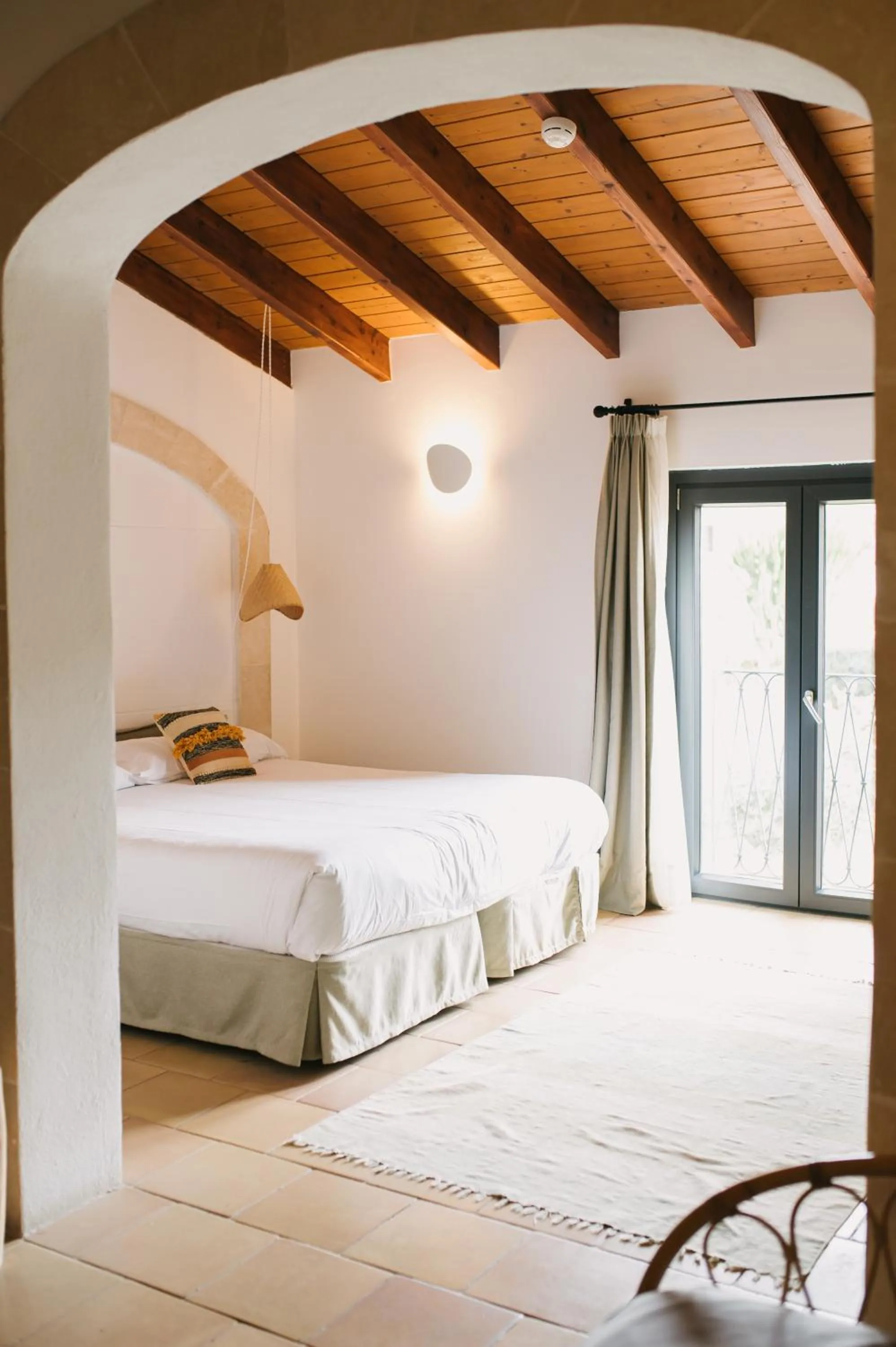 Bed in Curolla Petit Hotel