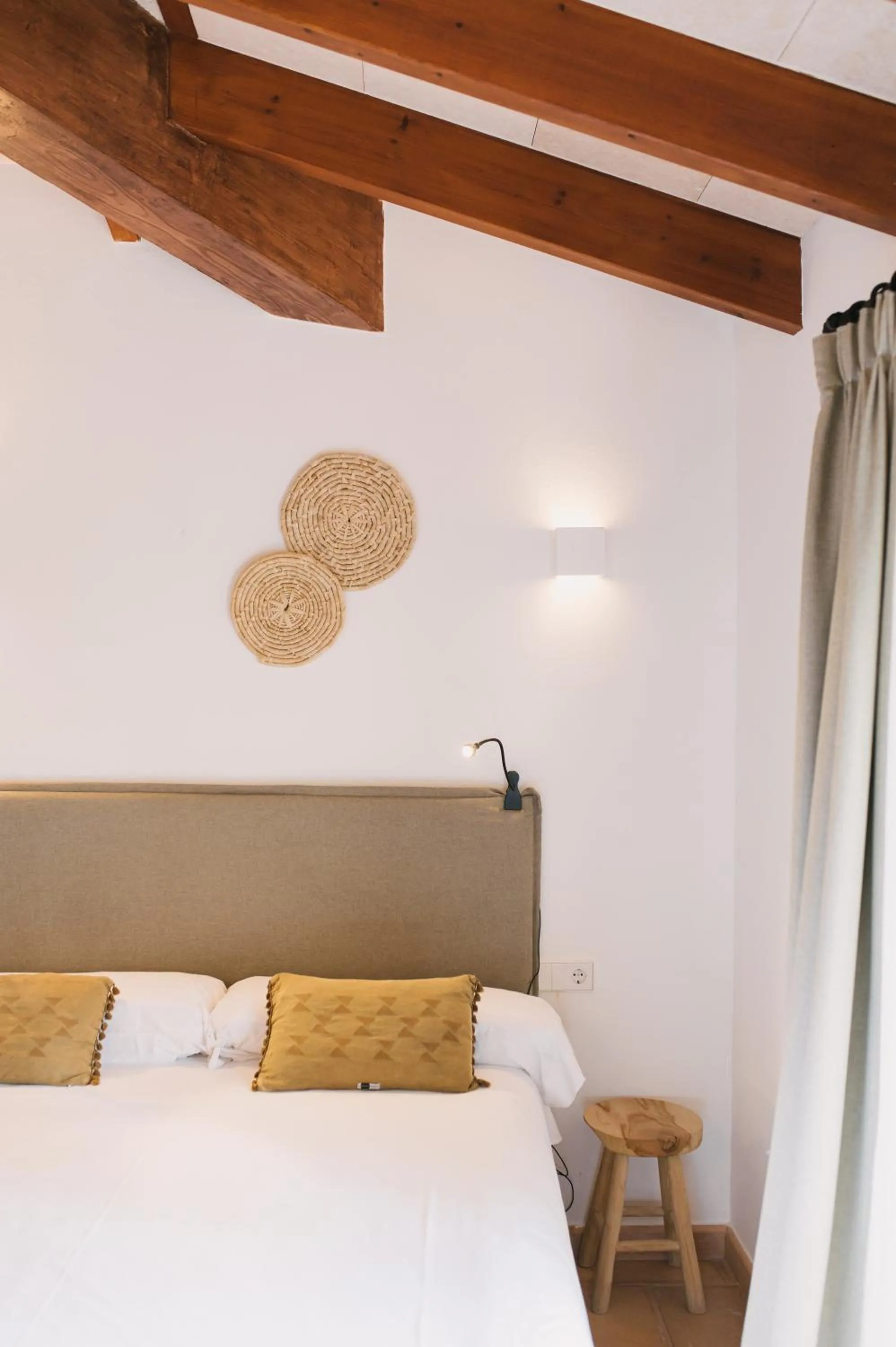 Bed in Curolla Petit Hotel