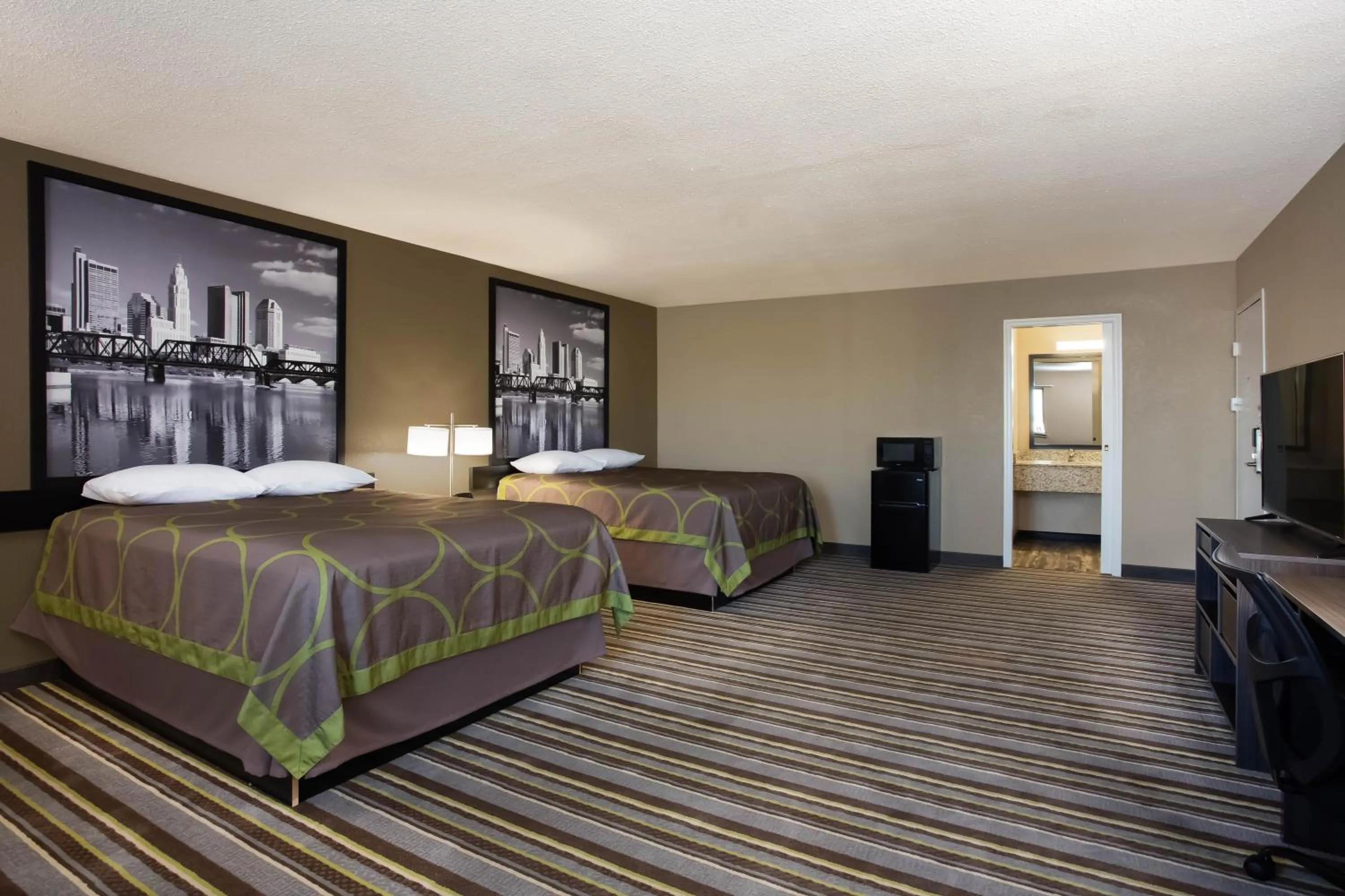 Photo of the whole room, Bed in Travel Inn Of Sidney Ohio