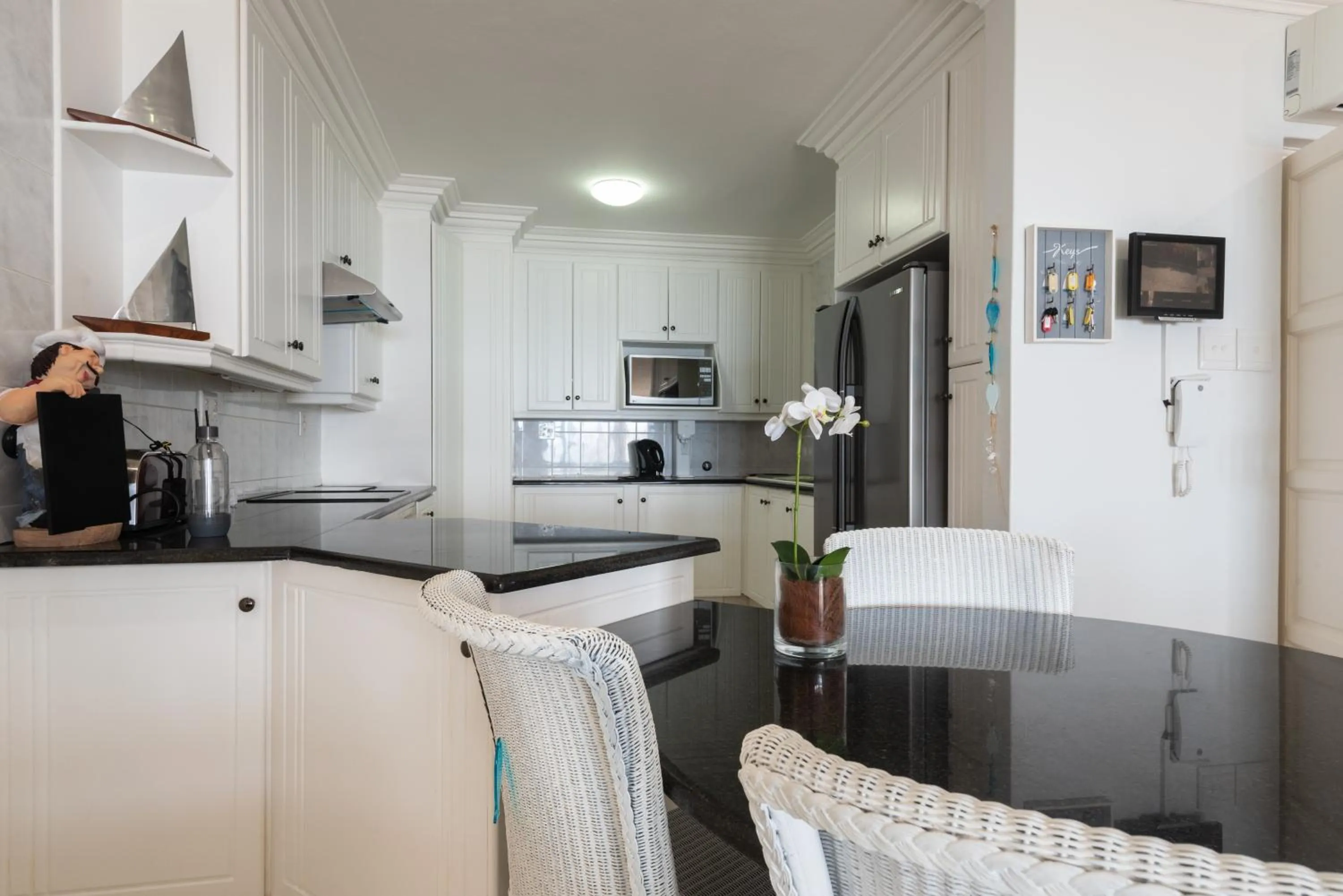 Kitchen or kitchenette in Dolphin Cove 2