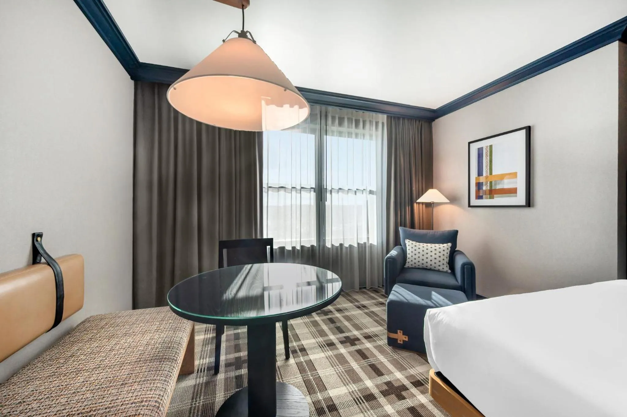 Photo of the whole room, Bed in Omni Interlocken Hotel