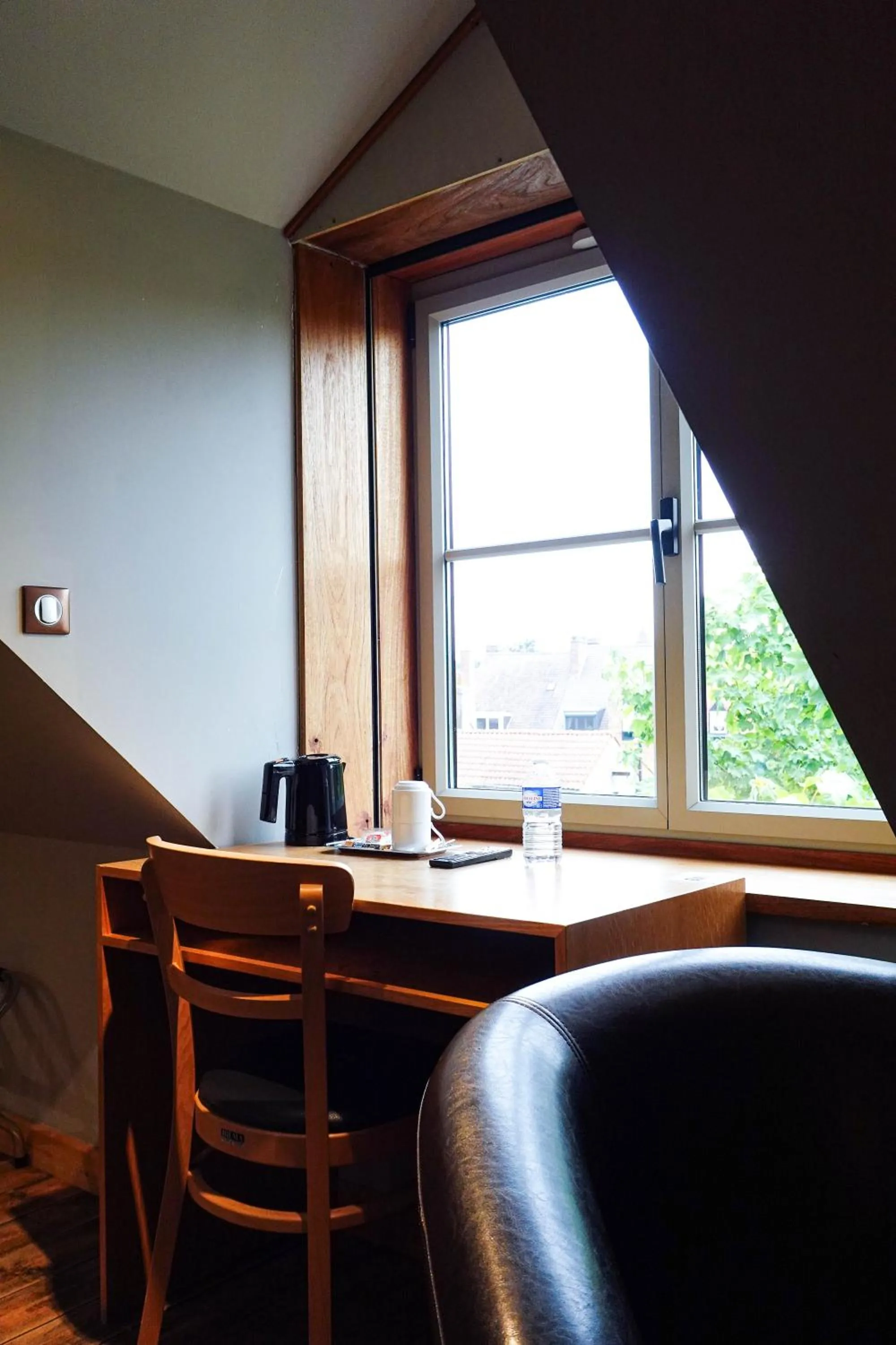 Seating area in Hôtel - Restaurant Au Tonnelier