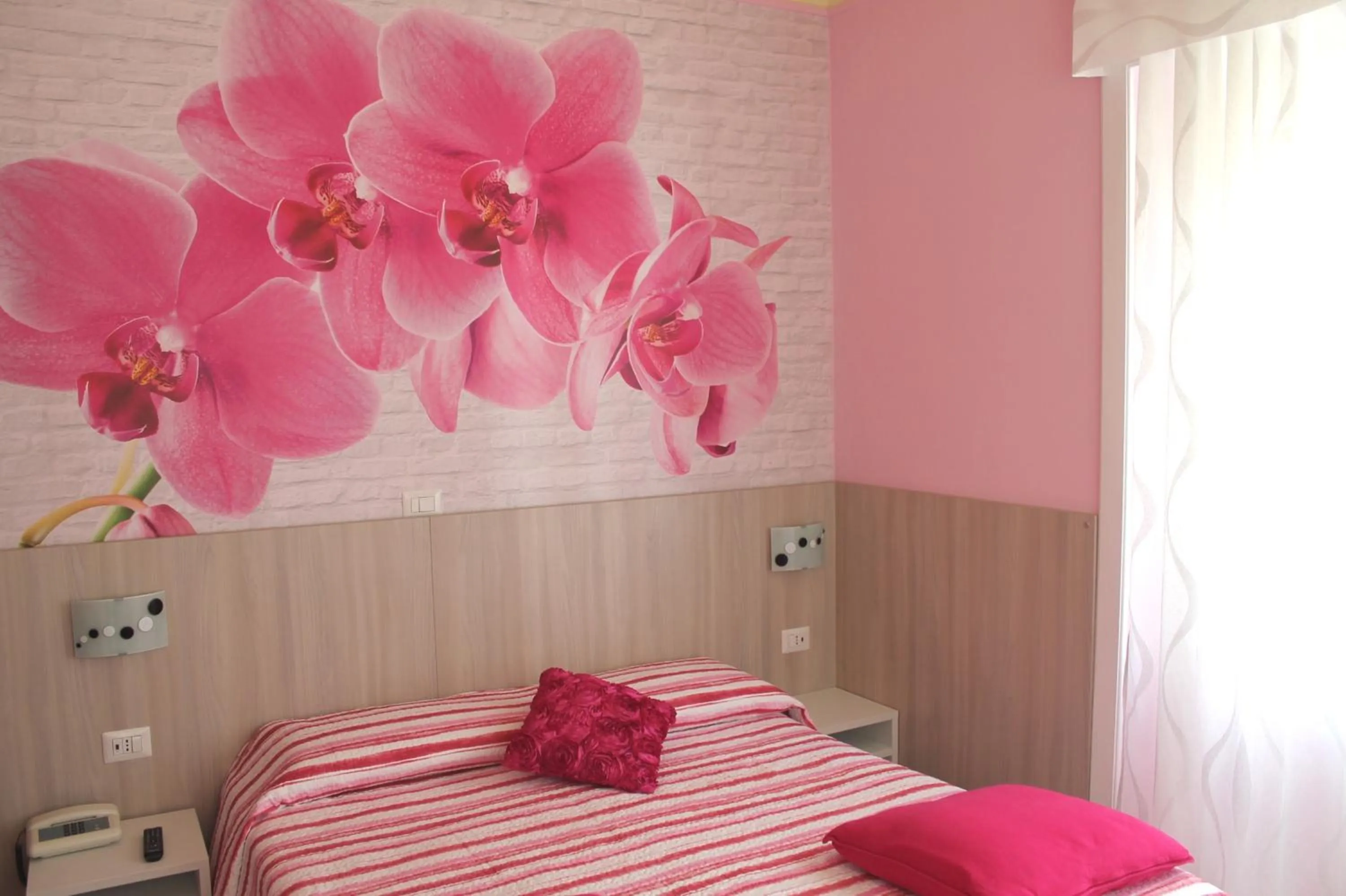 Bed in Albergo Paradiso