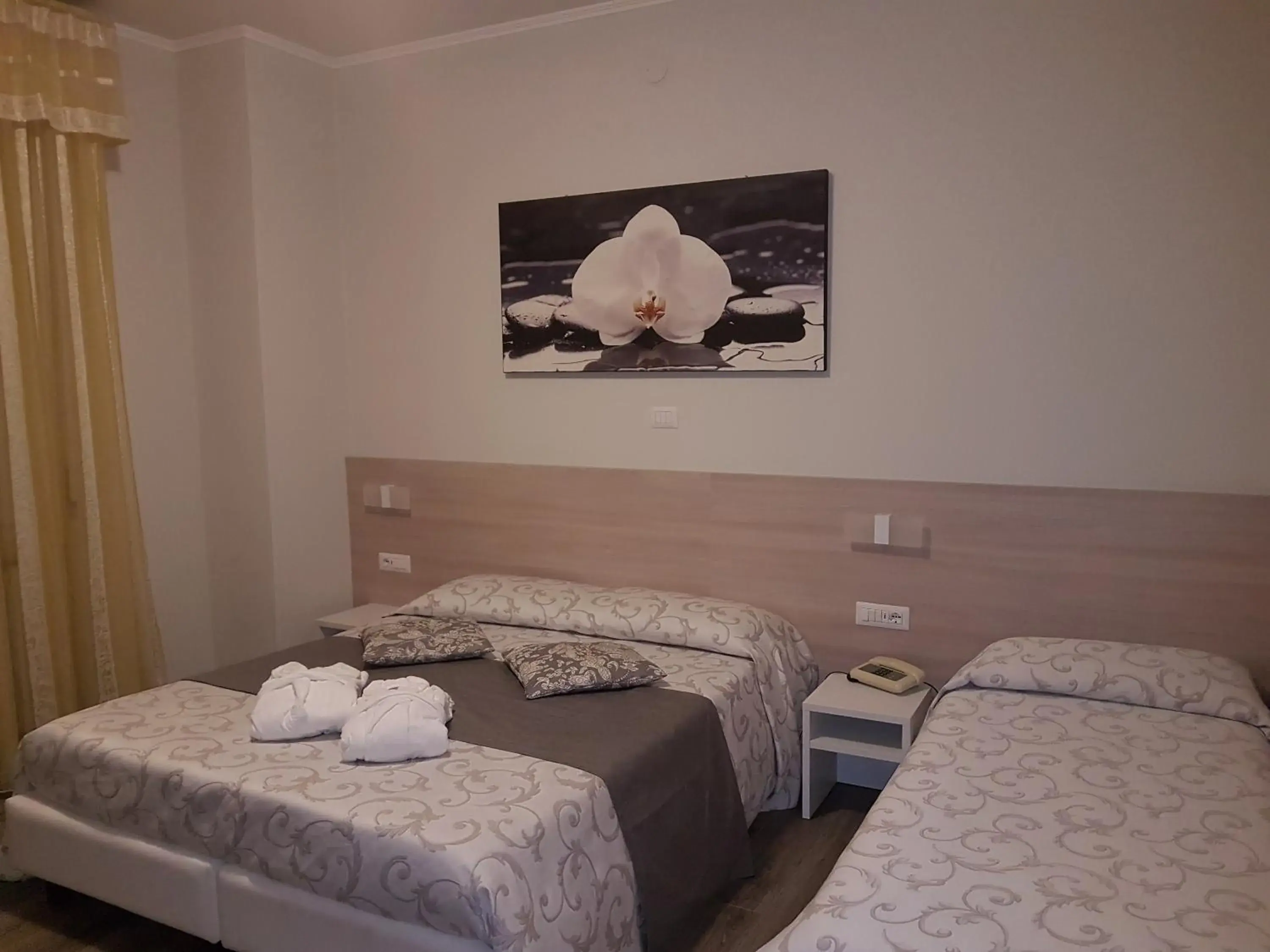 Bed in Albergo Paradiso Bed in Albergo Paradiso