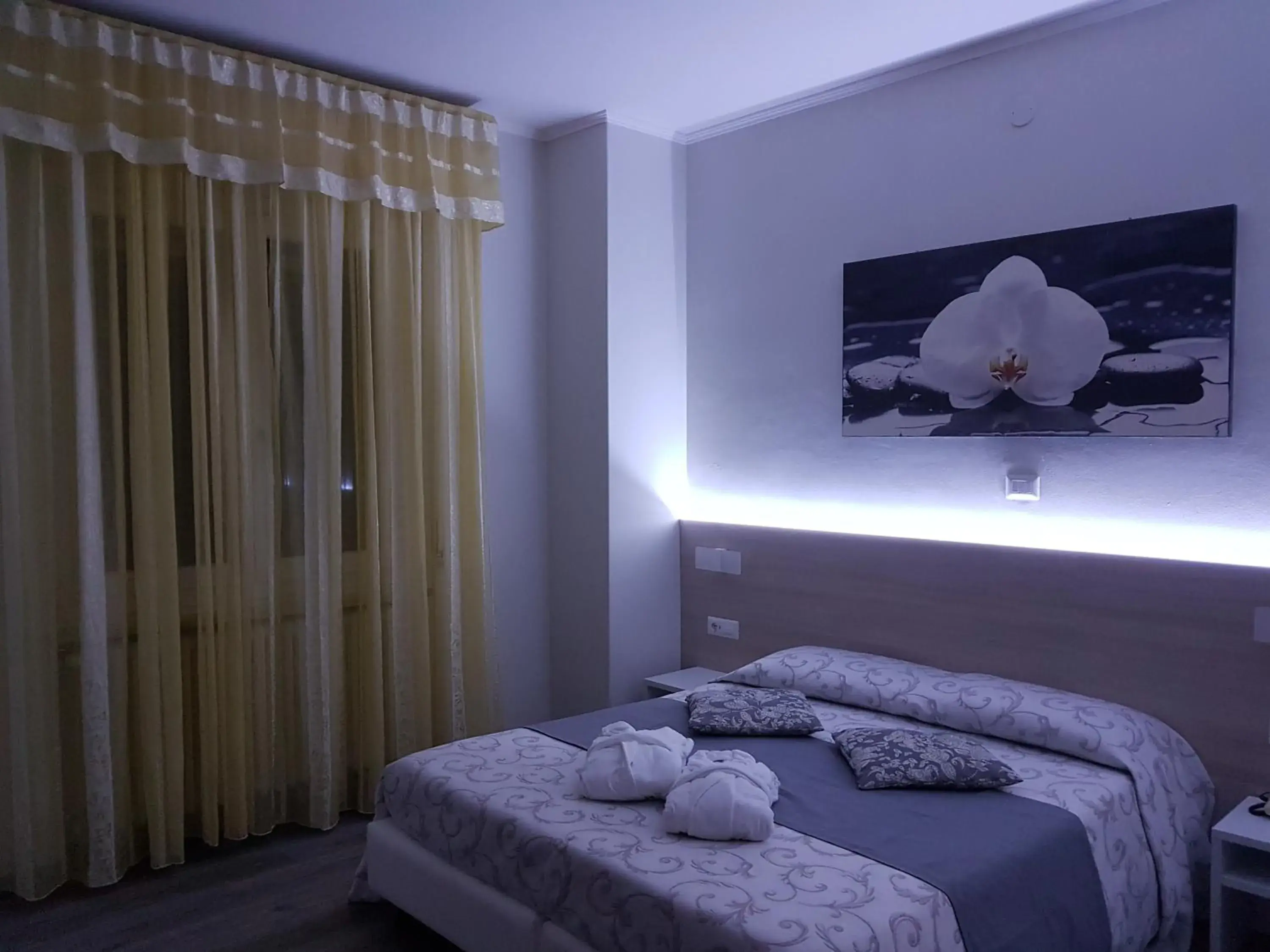 Bed in Albergo Paradiso Bed in Albergo Paradiso