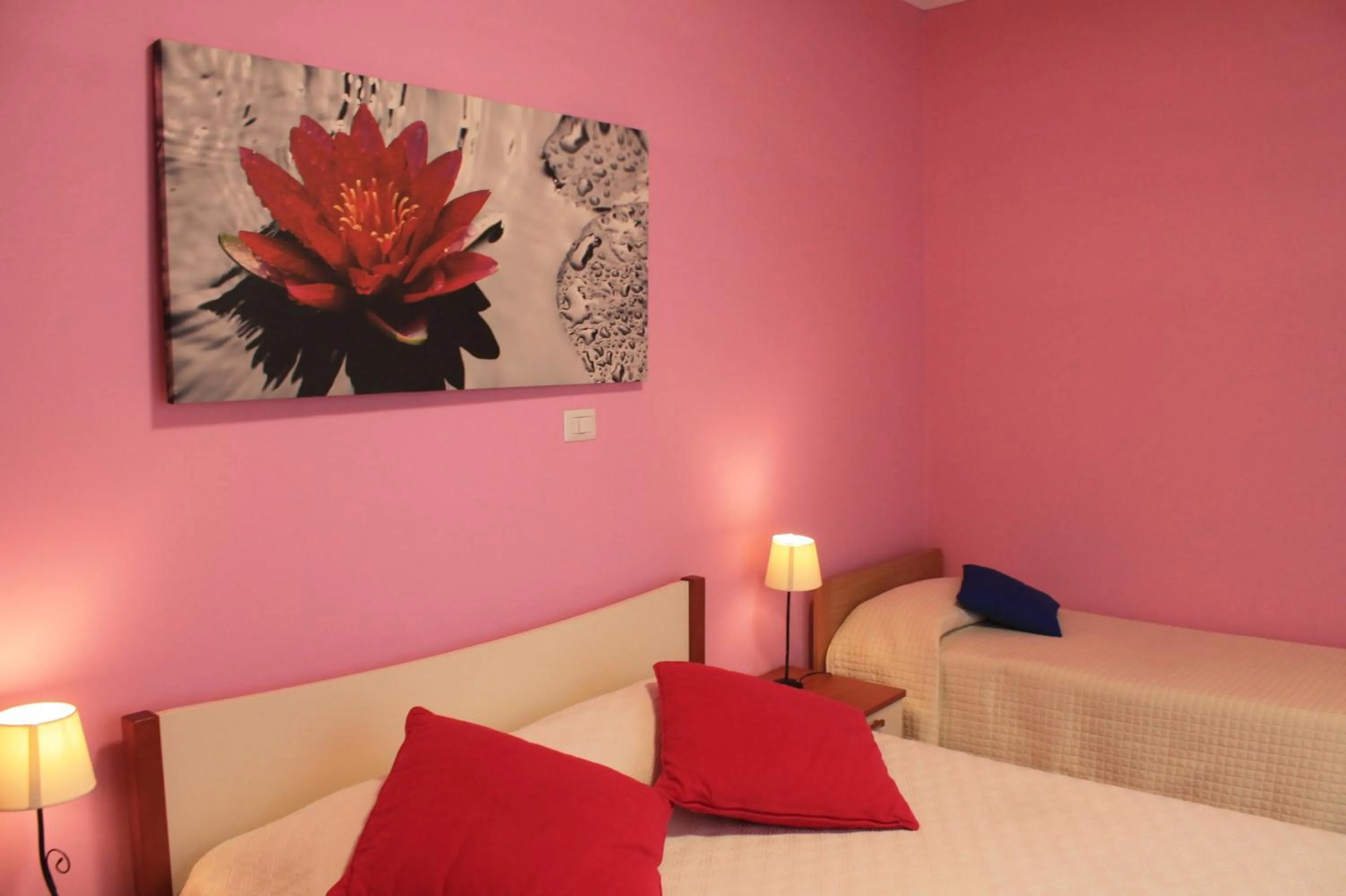 Bed in Albergo Paradiso