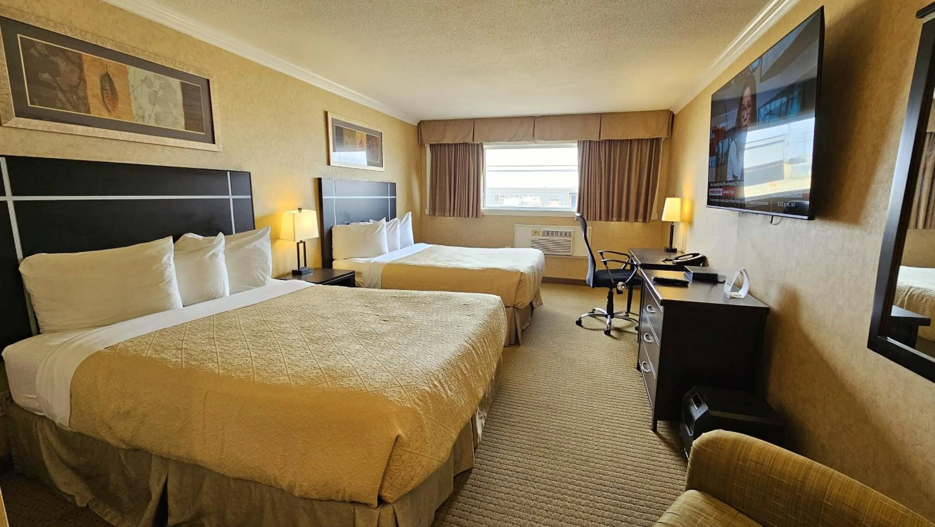 Bed in The George Dawson Inn & Conference Centre