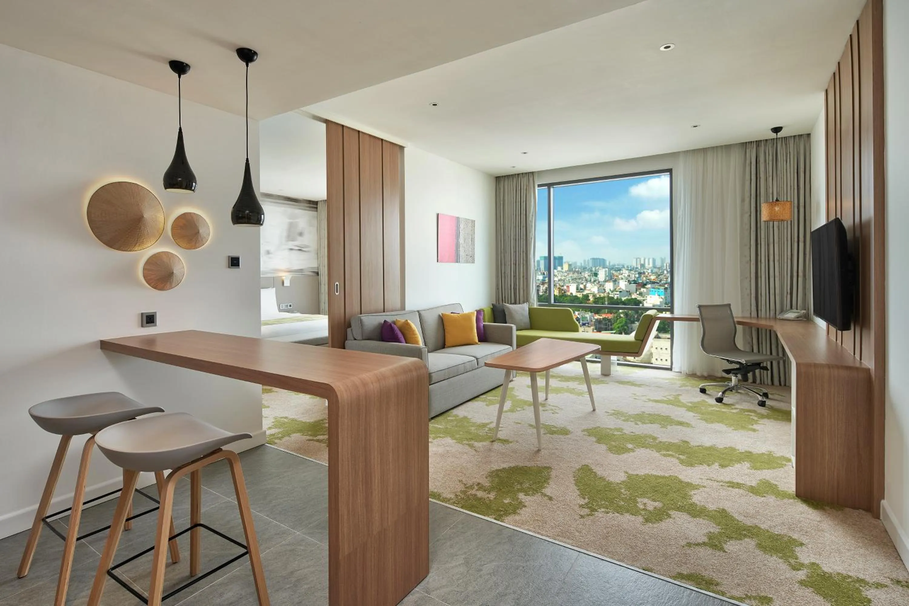 Living room in Holiday Inn & Suites Saigon Airport by IHG