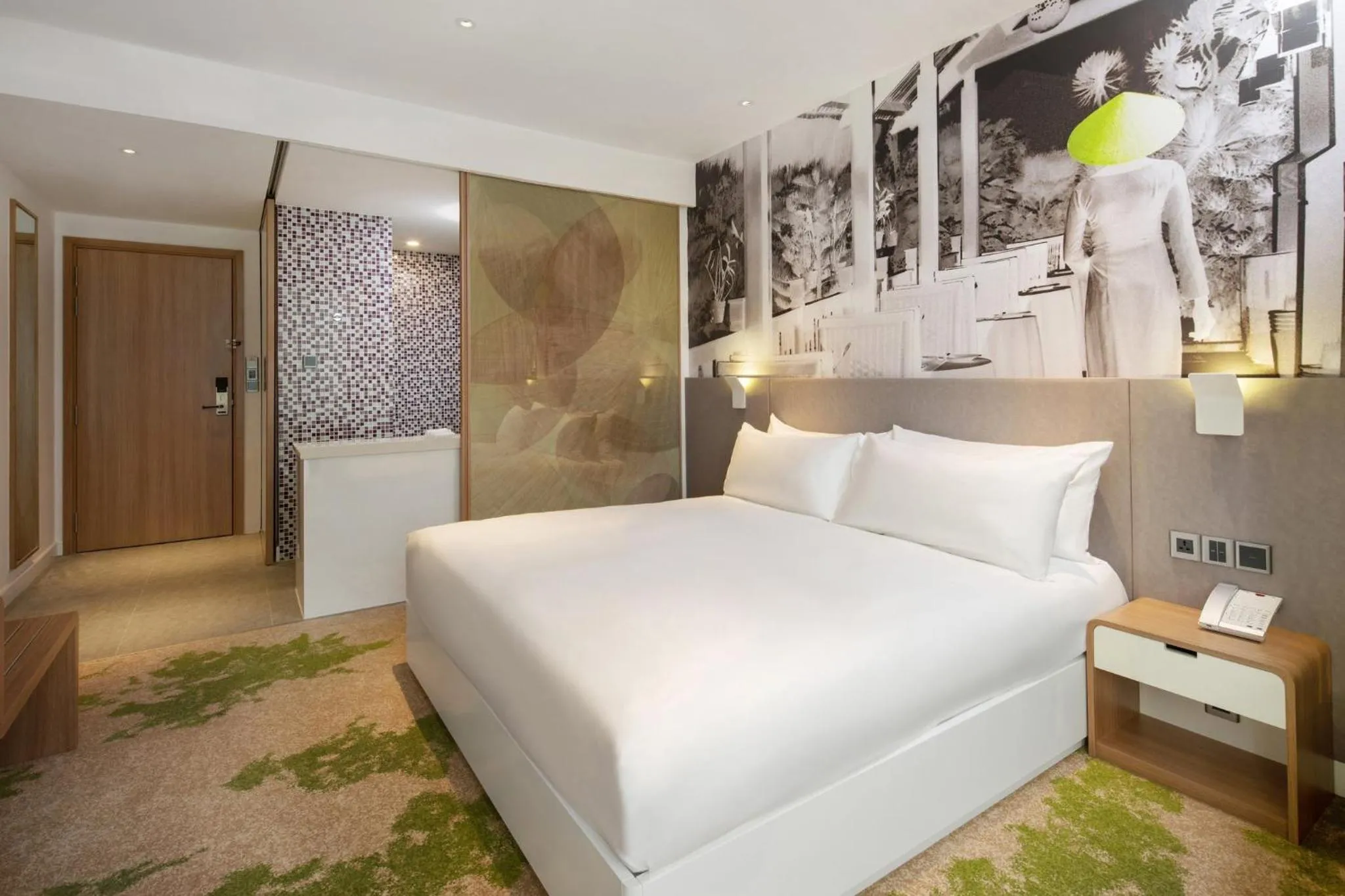 Photo of the whole room, Bed in Holiday Inn & Suites Saigon Airport by IHG