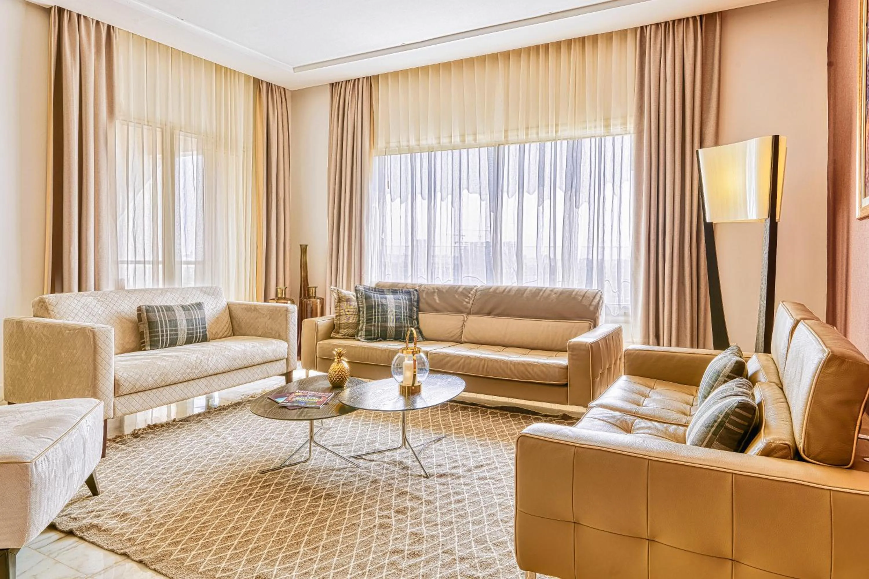 Living room in ADAM Hotel Suites