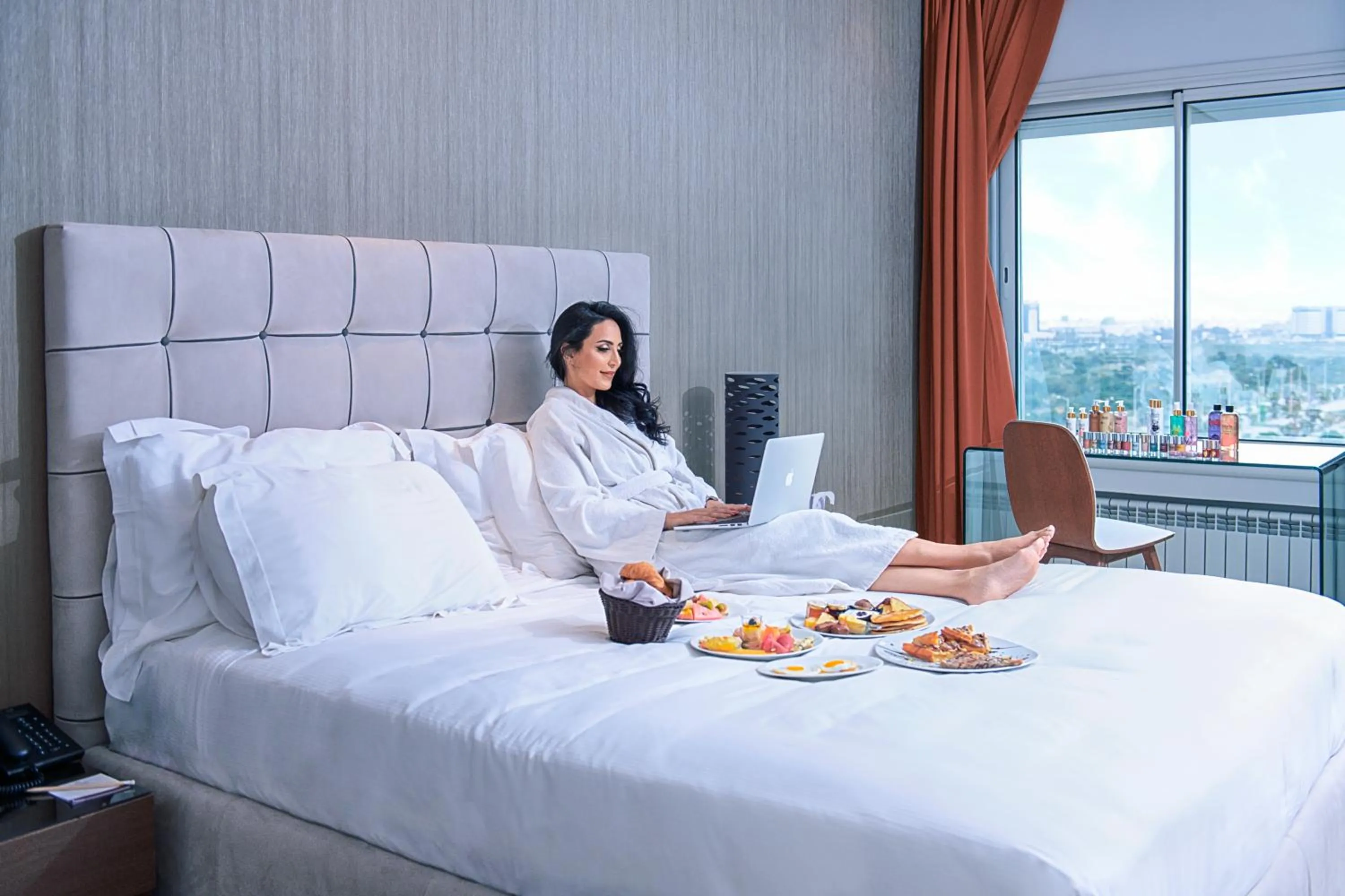 Bed in ADAM Hotel Suites