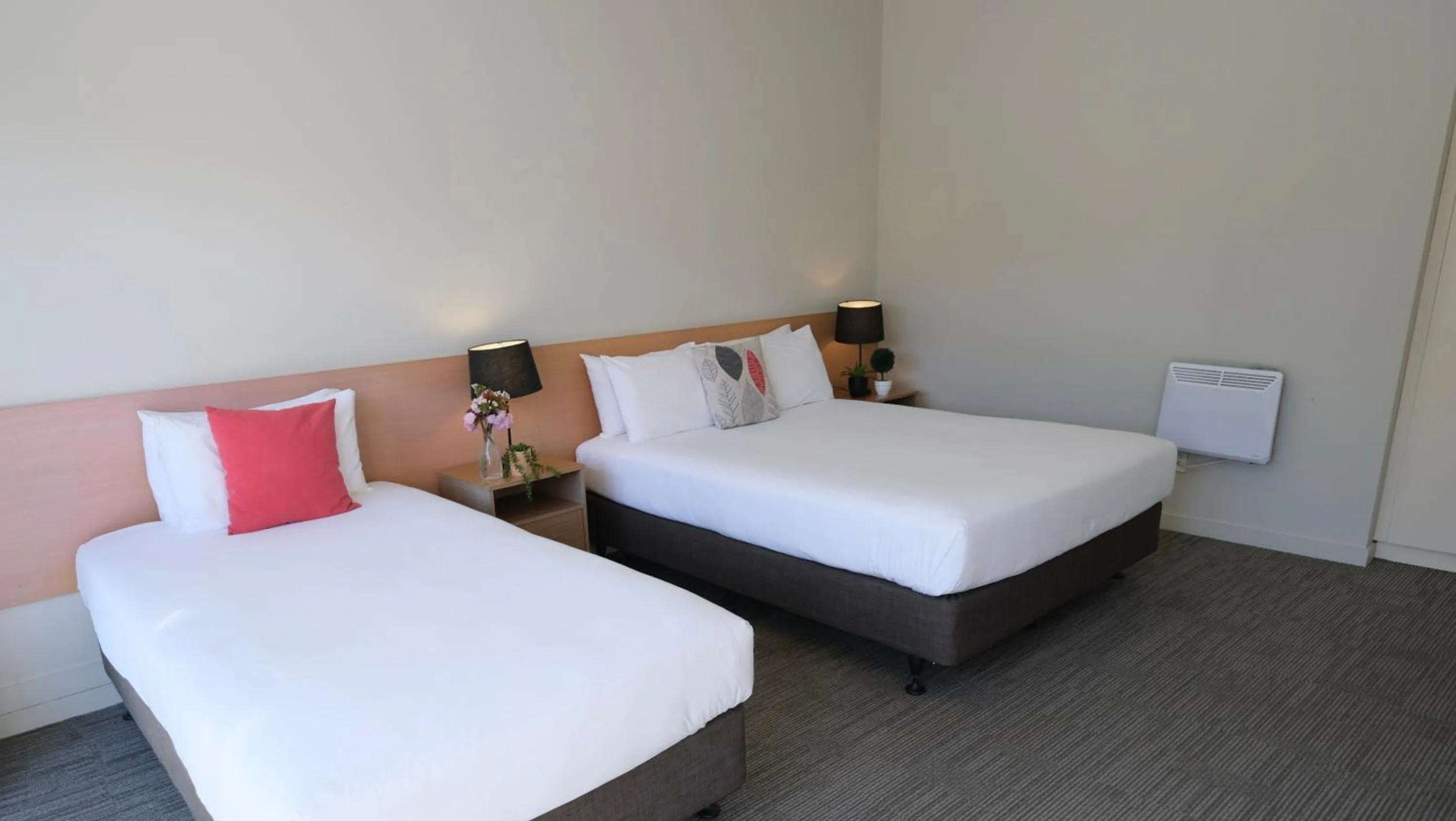 Bed in The Garden Hotel